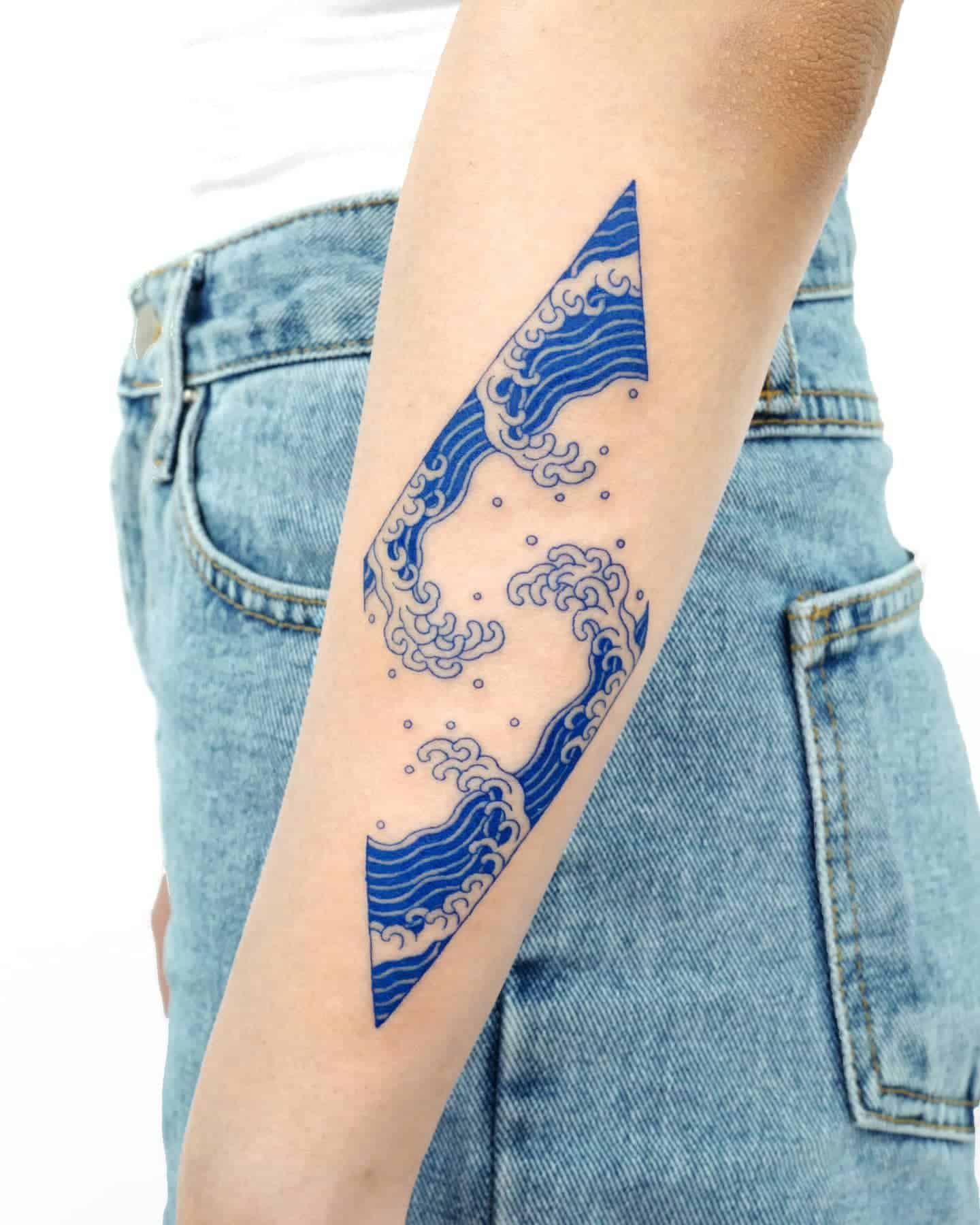 Riding The Waves Of Tattoo Art The Symbolic Meaning Of Wave Tattoos   TATTOOGOTO