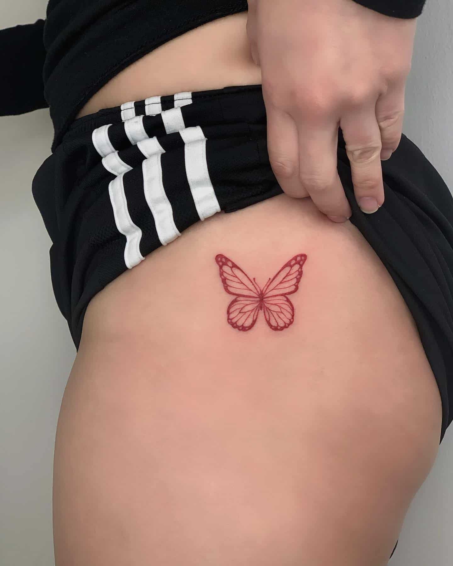 red ink butterfly tattoo  Pink tattoo ink Red ink tattoos Creative  tattoos