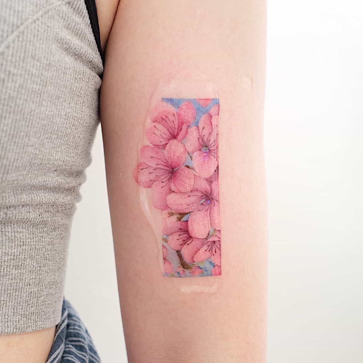 35 Beautiful Cherry Blossom Tattoo Ideas for Men & Women in 2023