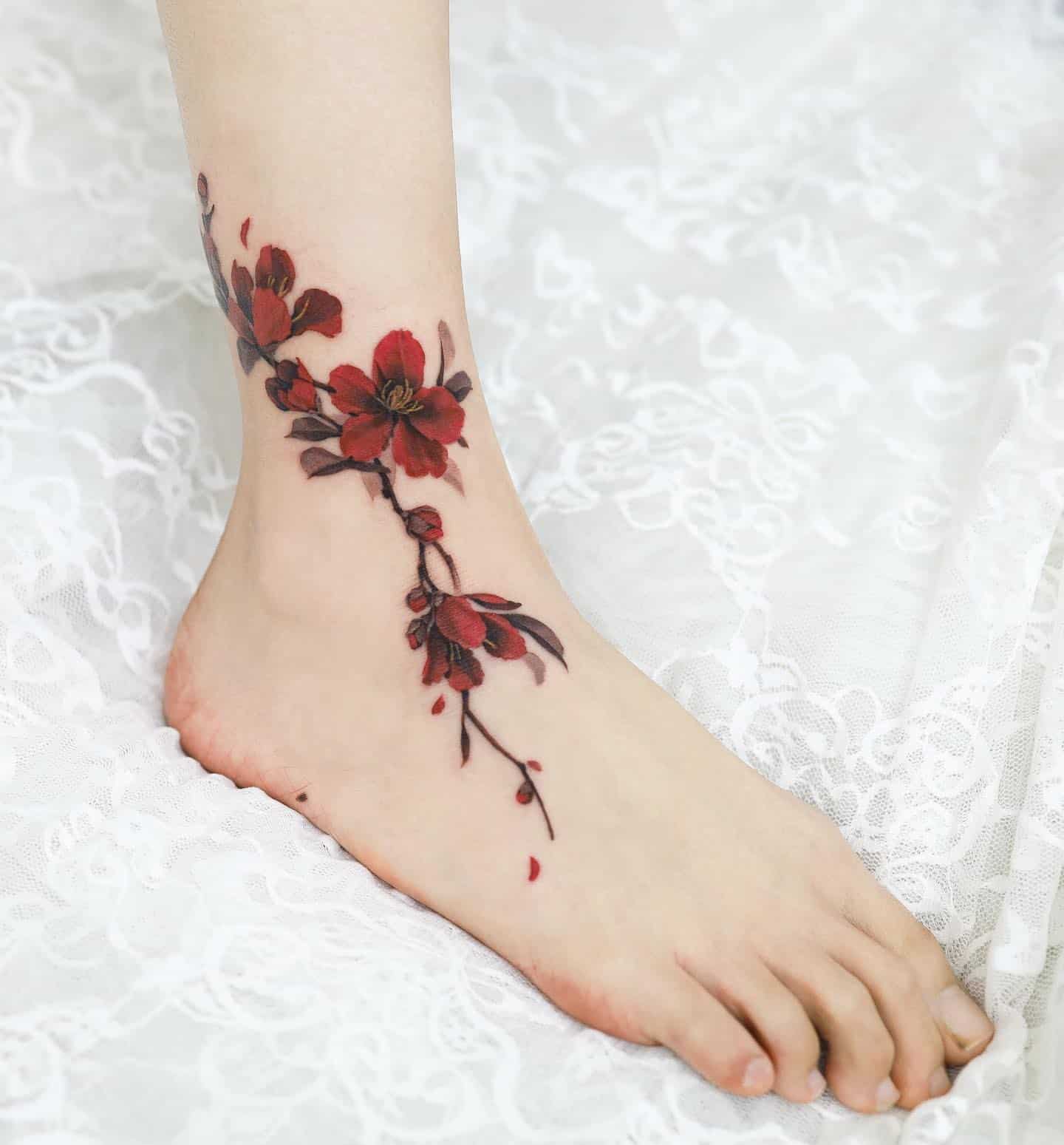 Cherry blossom foot tattoo : r/agedtattoos