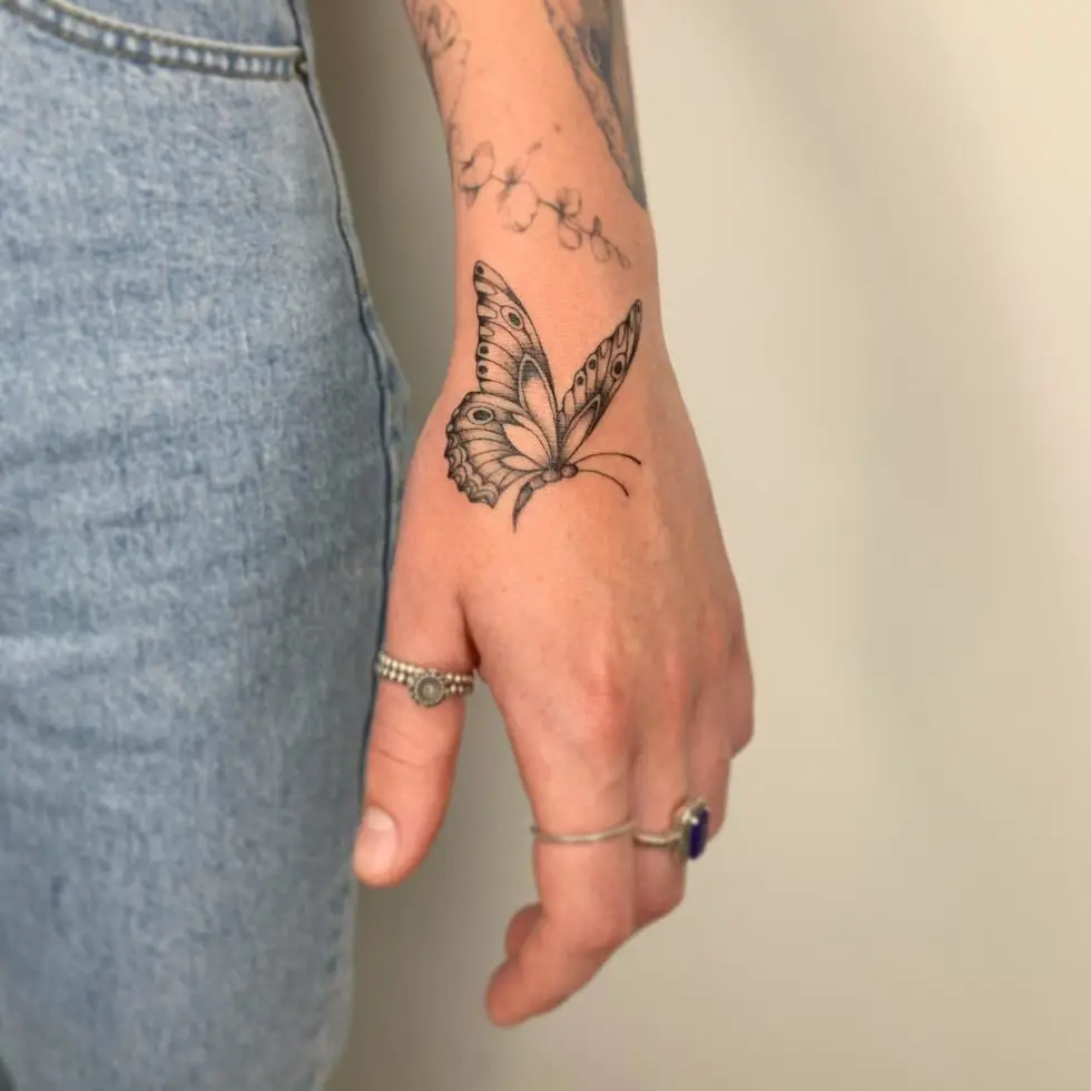 30 Awesome Butterfly Hand Tattoo Ideas for Men & Women in 2024