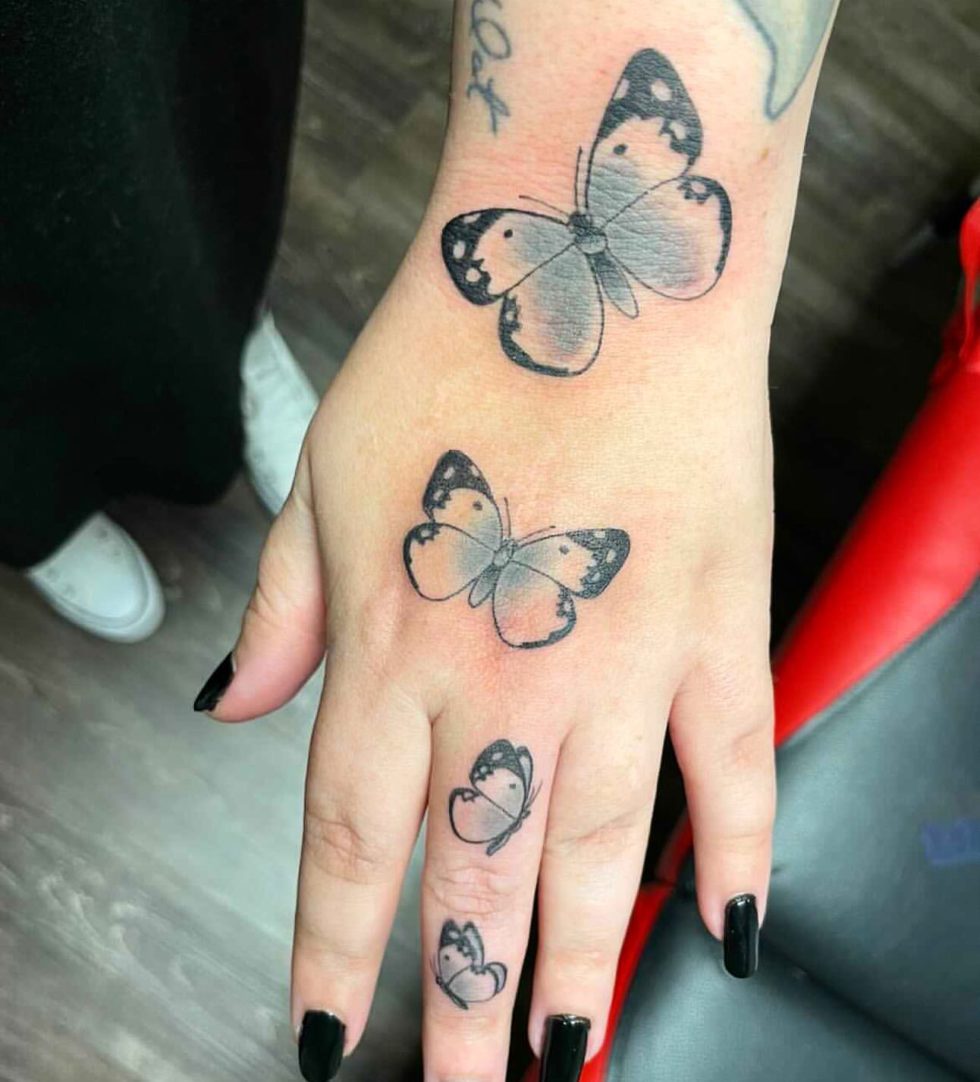 30 Awesome Butterfly Hand Tattoo Ideas for Men & Women in 2024