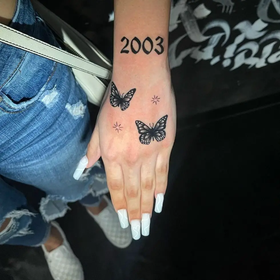 30 Awesome Butterfly Hand Tattoo Ideas for Men & Women in 2024