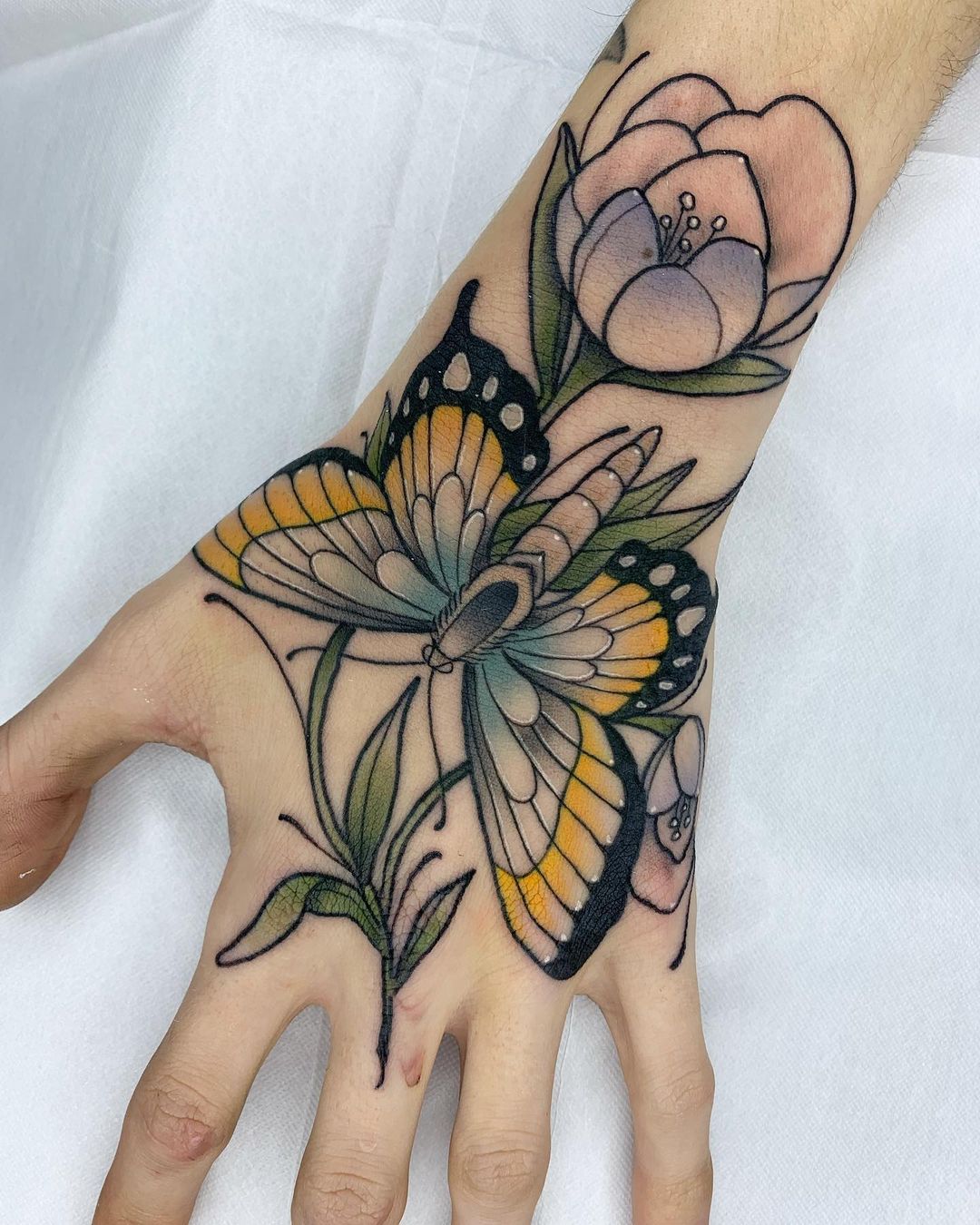 Butterfly Hand Tattoo Ideas 34
