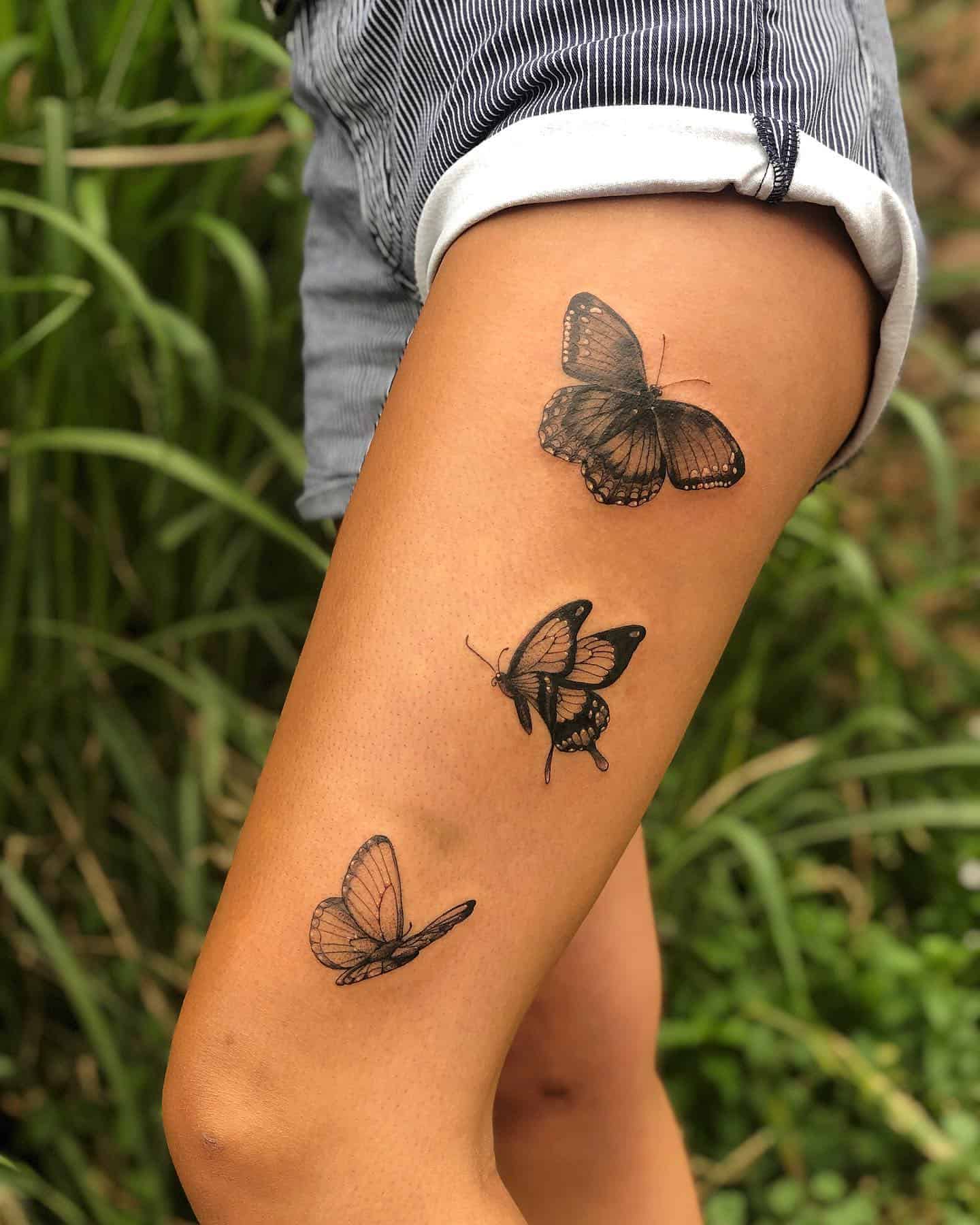Cute butterfly tattoos on thigh