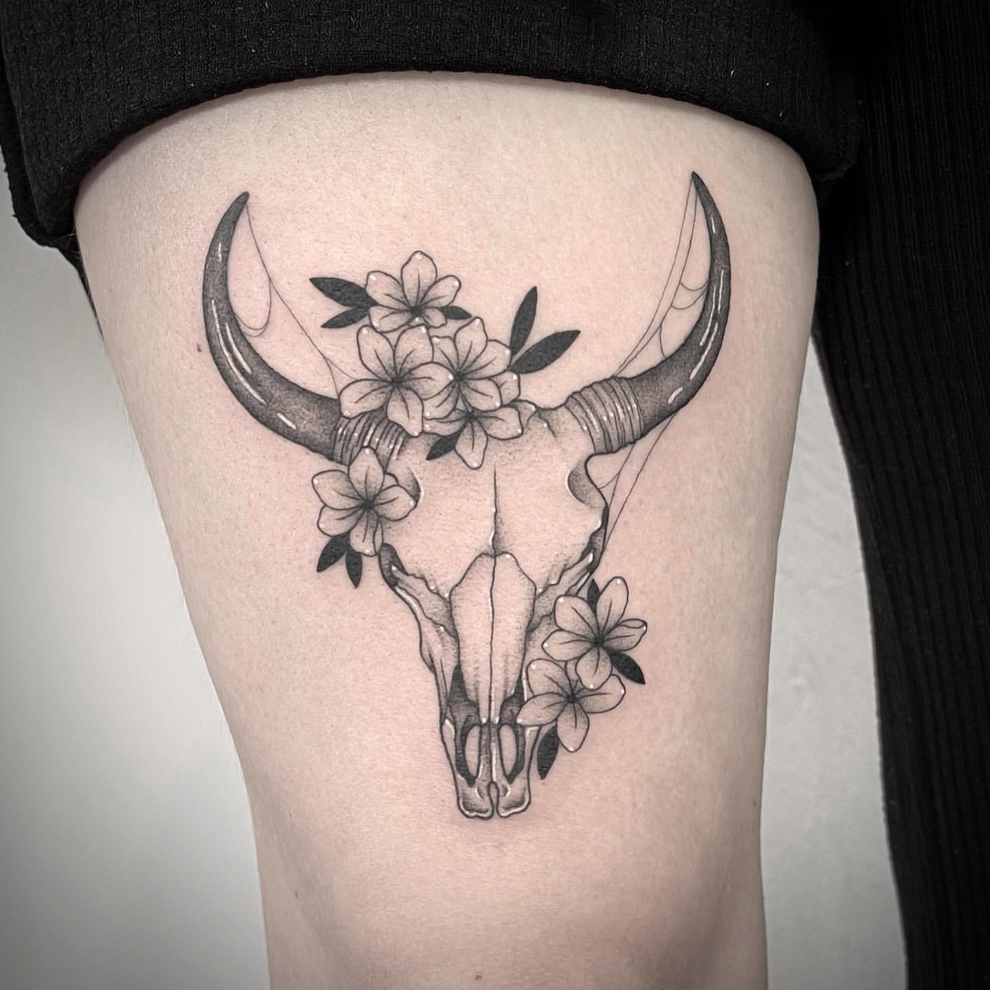 Feminine bull skull tattoo
