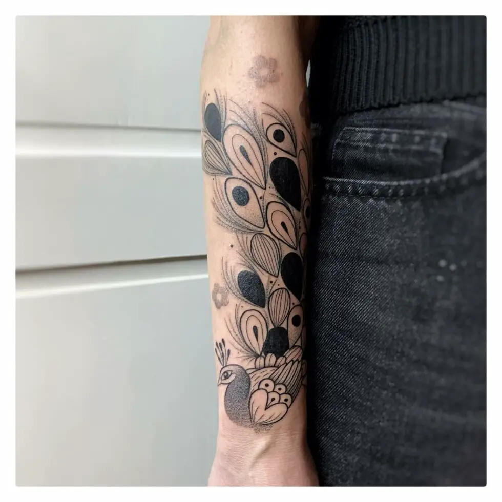 40 Beautiful Peacock Tattoo Ideas for Men & Women in 2024