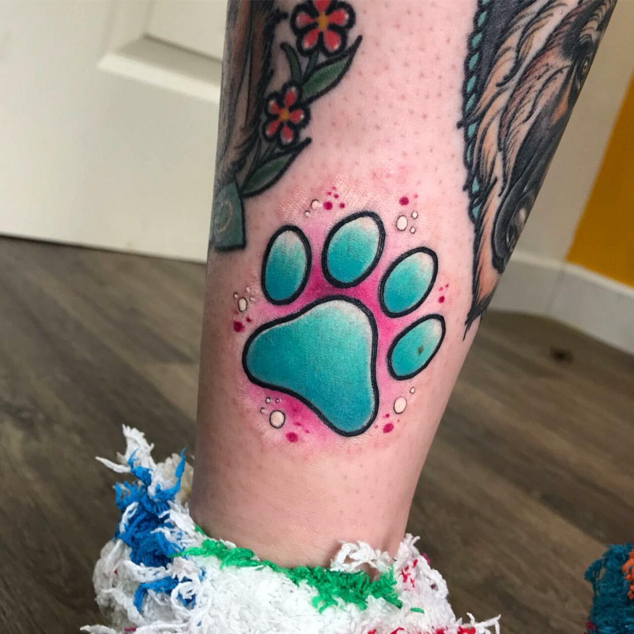 26 Adorable Paw Print Tattoo Ideas for Men & Women in 2024