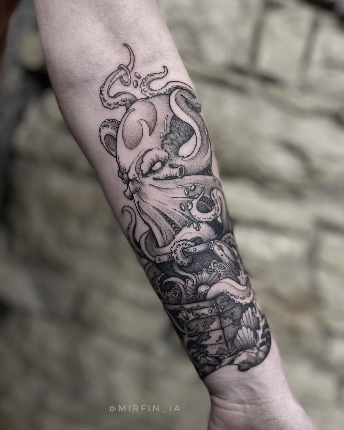 Forearm kraken tattoo