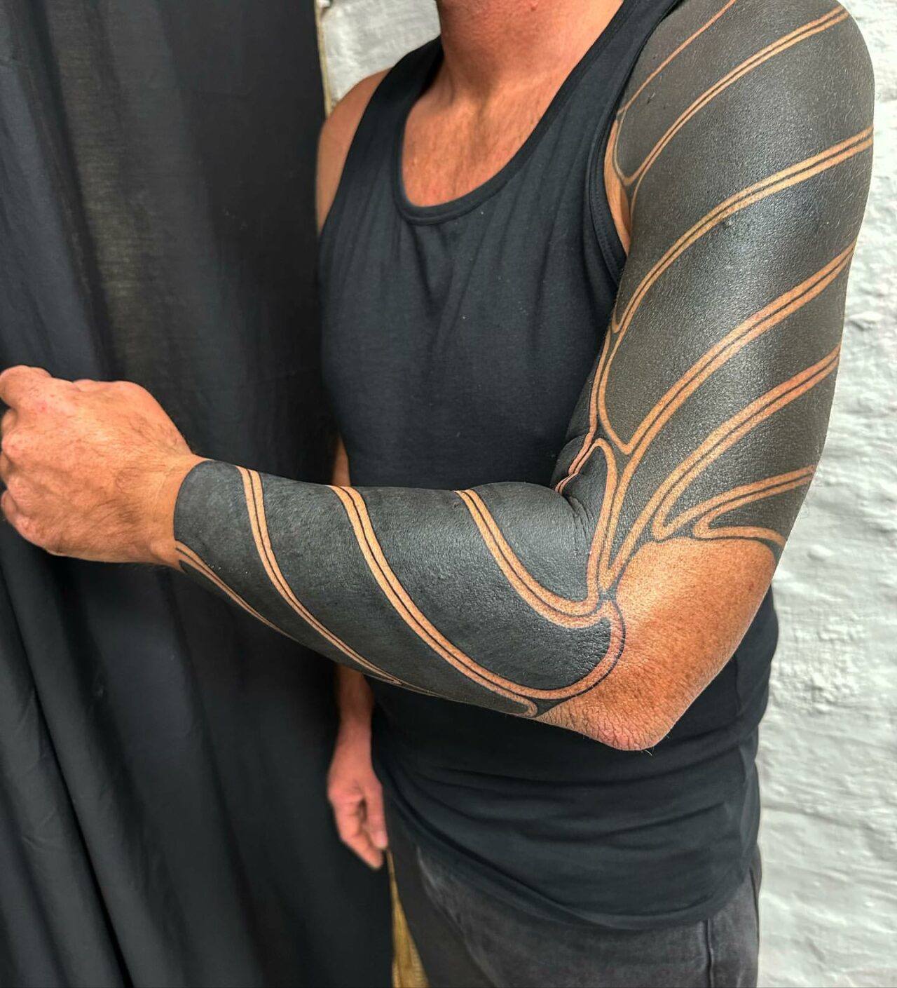 33 Breathtaking Blackout Tattoo Ideas for Men & Women in 2024