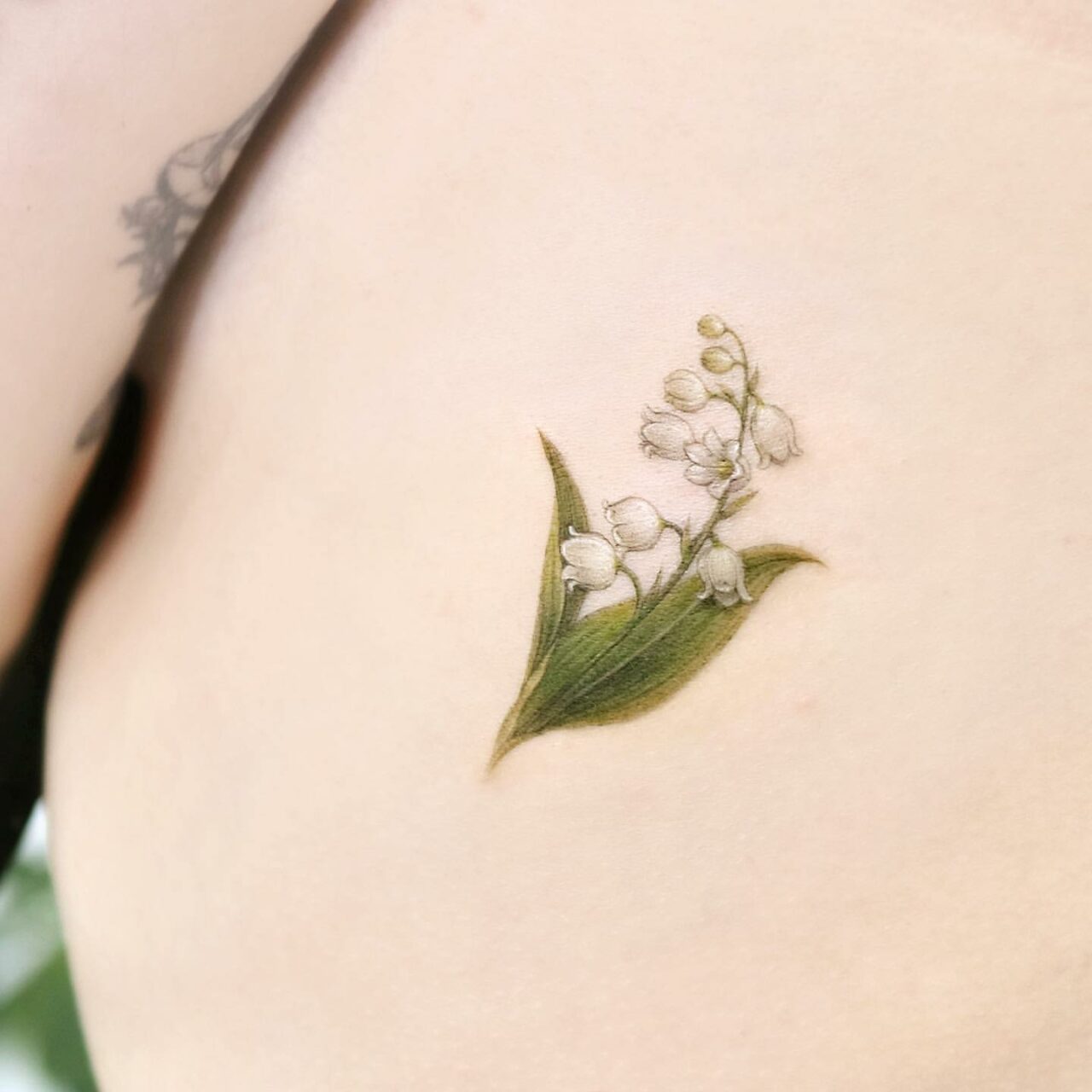 28 Lovely Lily Of The Valley Tattoo Ideas to Inspire You in 2024