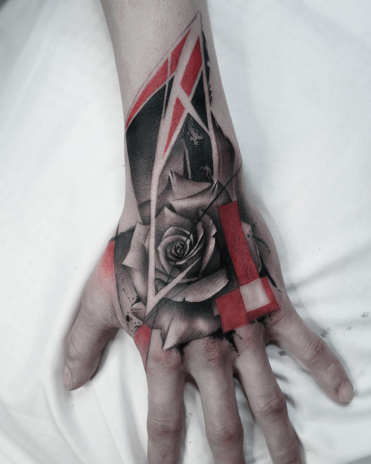 Rose Hand Tattoo Ideas 9