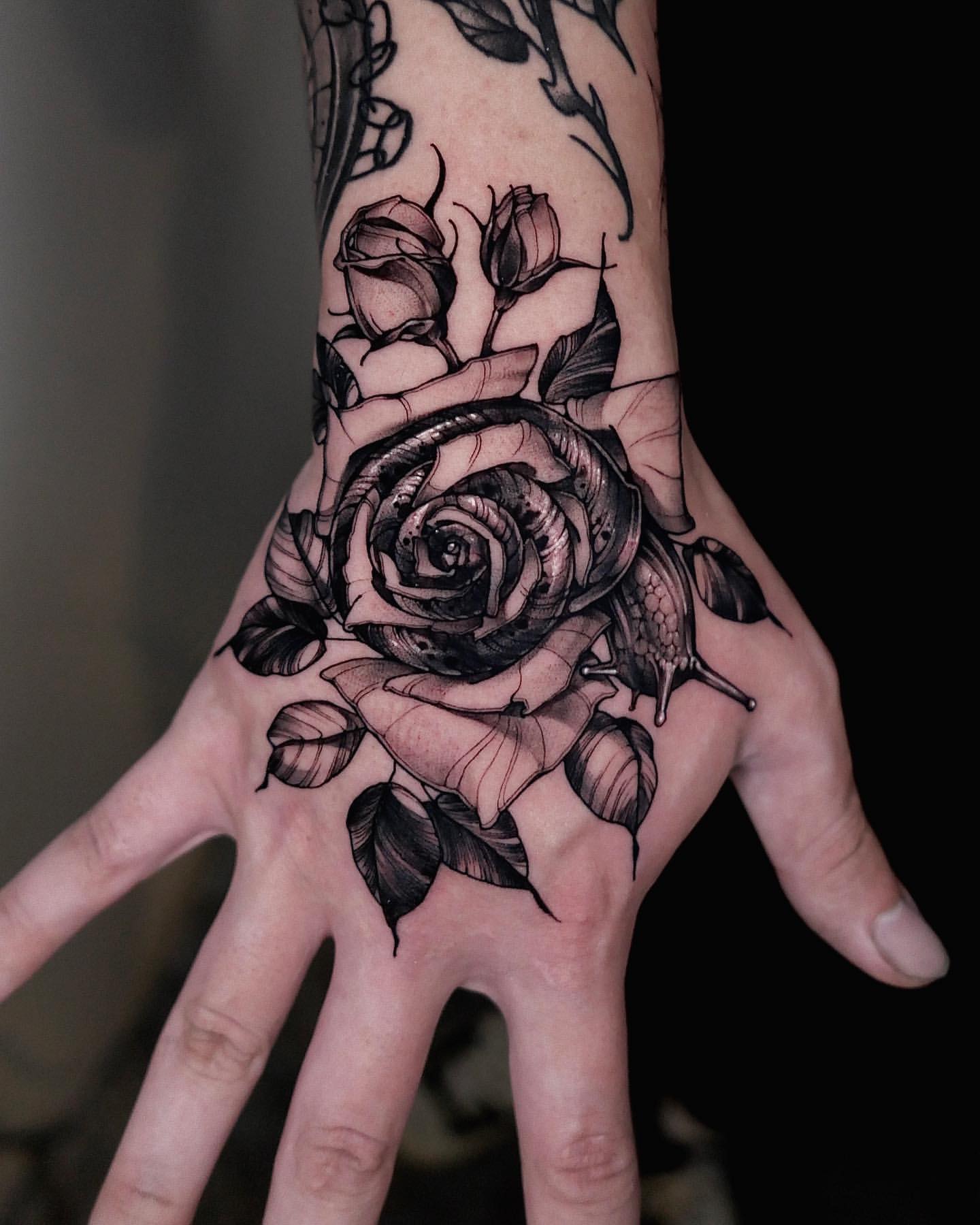 Rose Hand Tattoo Ideas 13