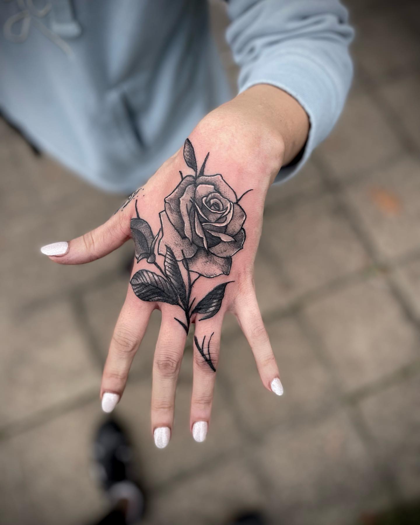Rose Hand Tattoo Ideas 20