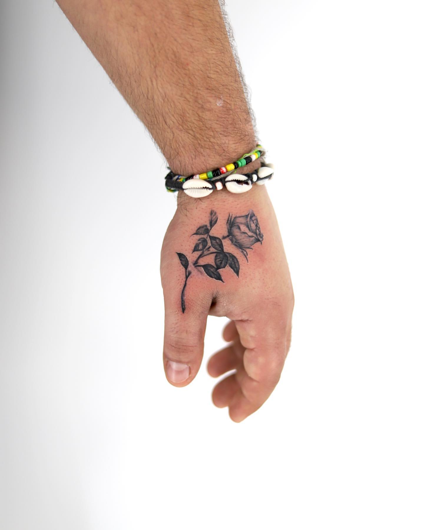 Rose Hand Tattoo Ideas 24