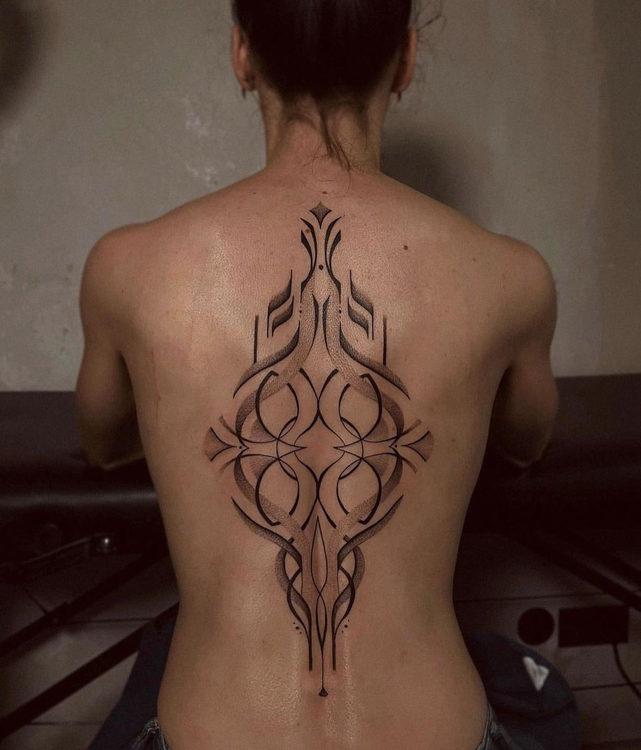 Back Tattoo Ideas for Women 33
