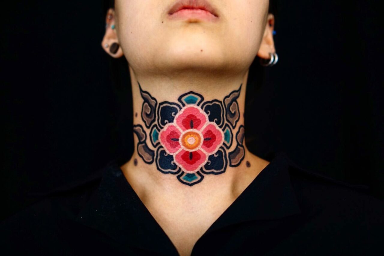33 Fantastic Throat Tattoo Ideas for Women in 2024