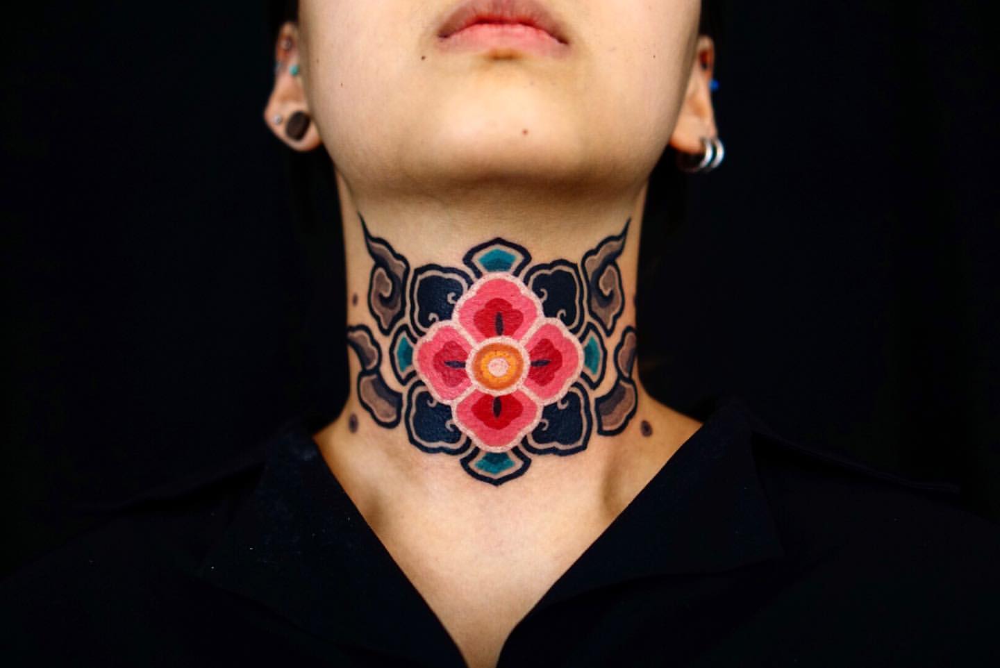 Throat Tattoo Ideas for Women 3