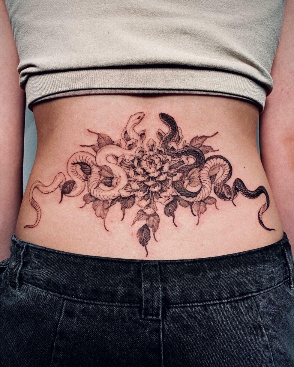30+ Lovely Lower Back Tattoo Ideas for Women in 2024