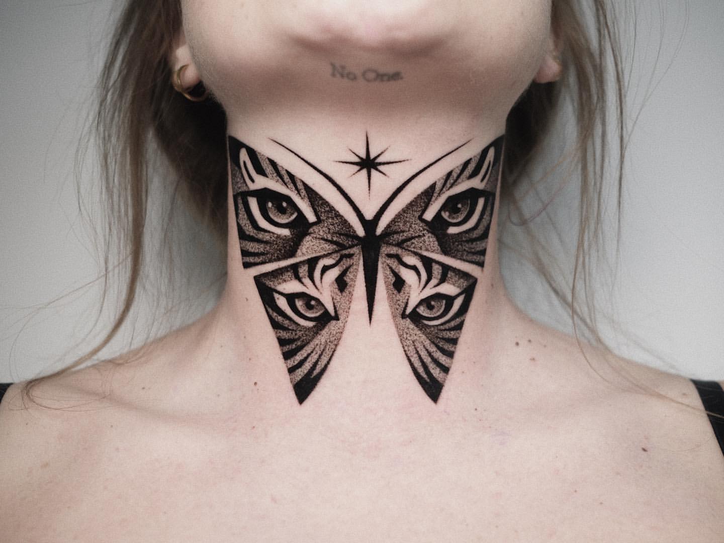 Throat Tattoo Ideas for Women 10