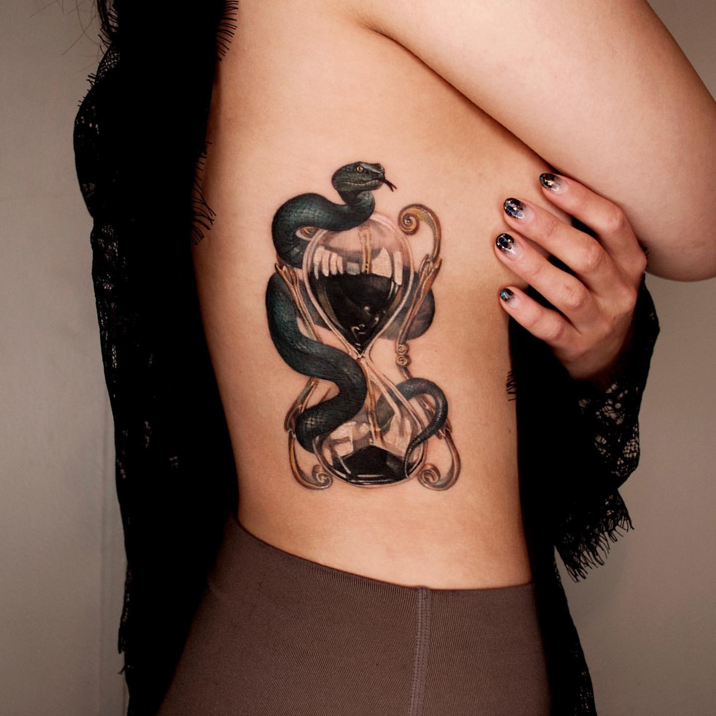 Rib Tattoos for Women 11