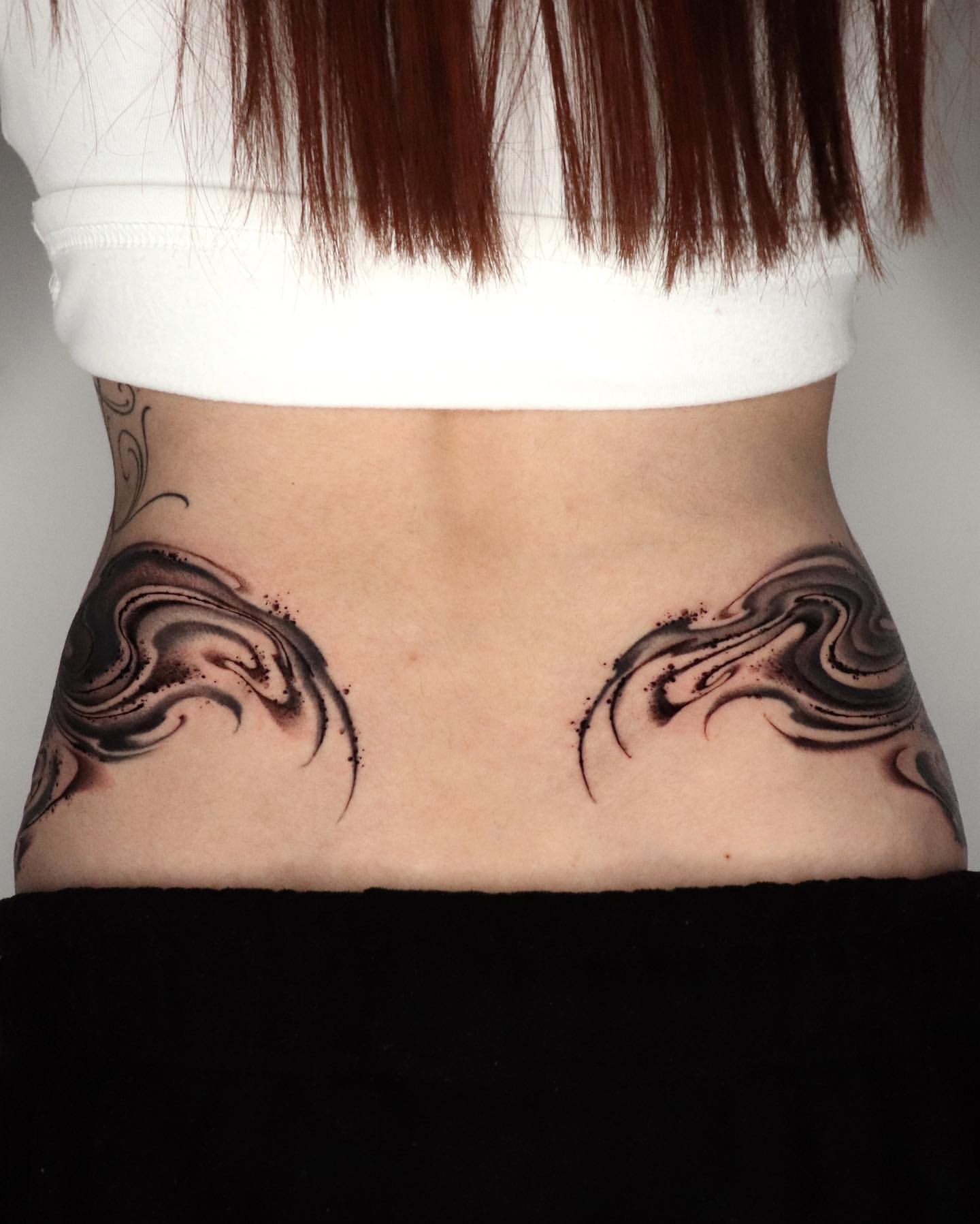 Lower Back Tattoos for Women 11