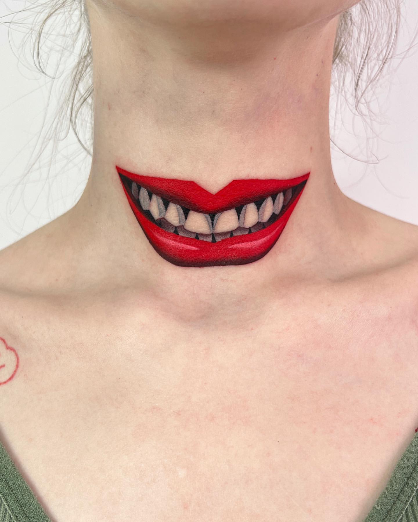 Throat Tattoo Ideas for Women 12