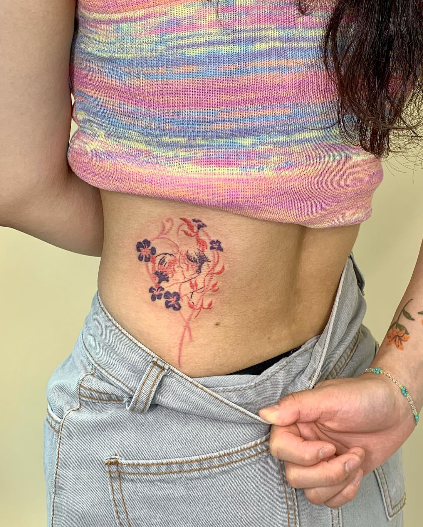 Lower Back Tattoos for Women 13