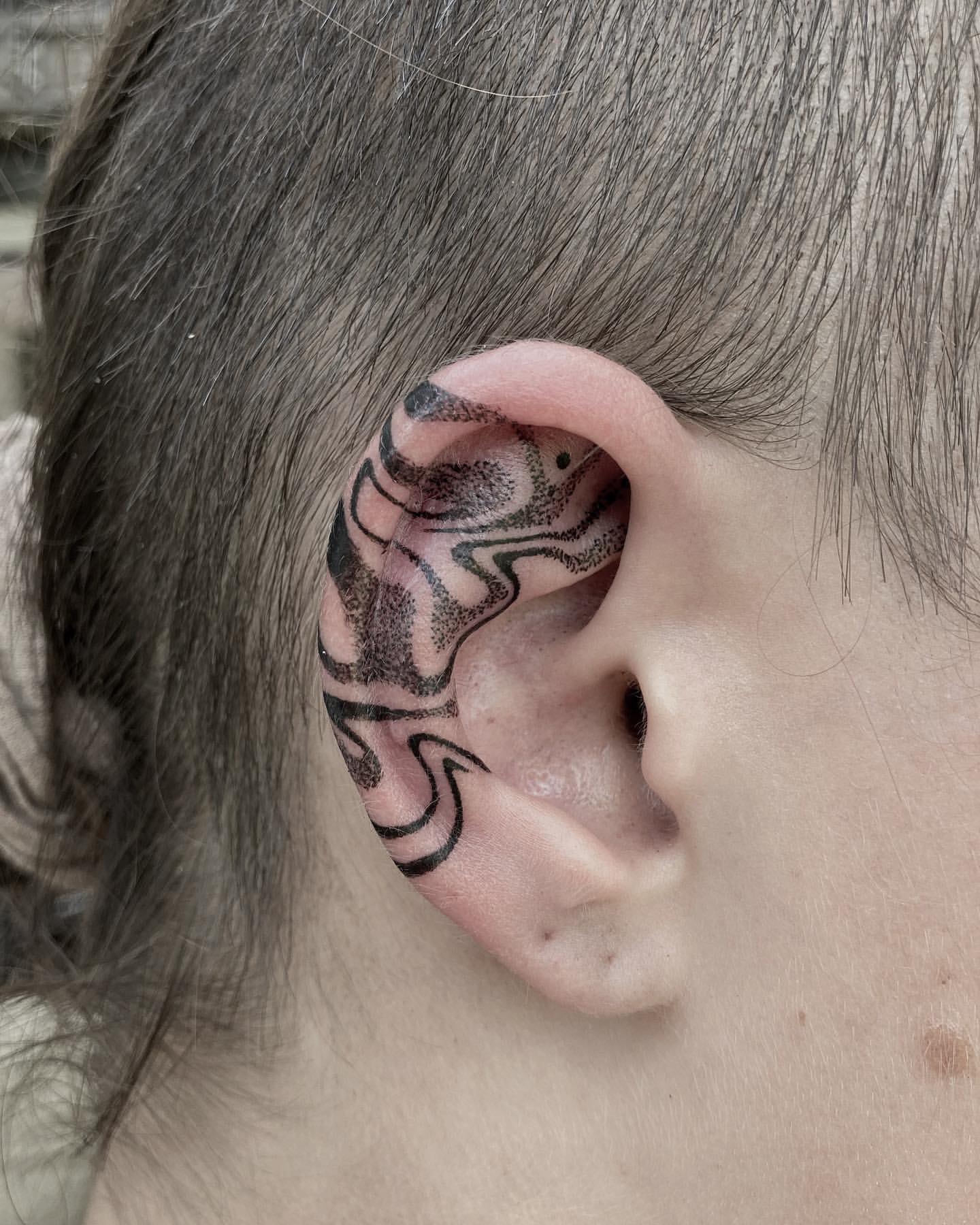 Ear Tattoo Ideas 14