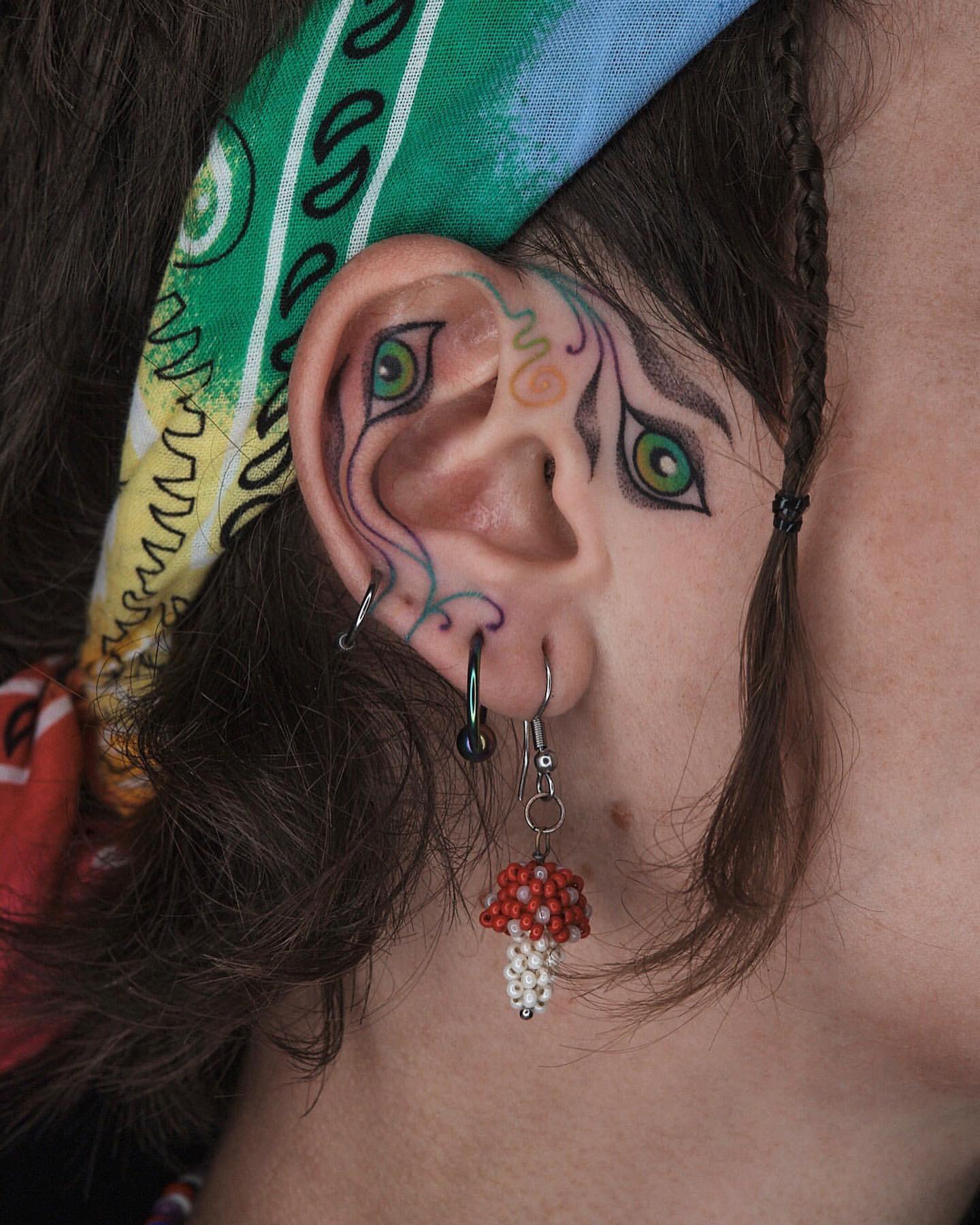 Ear Tattoo Ideas 15