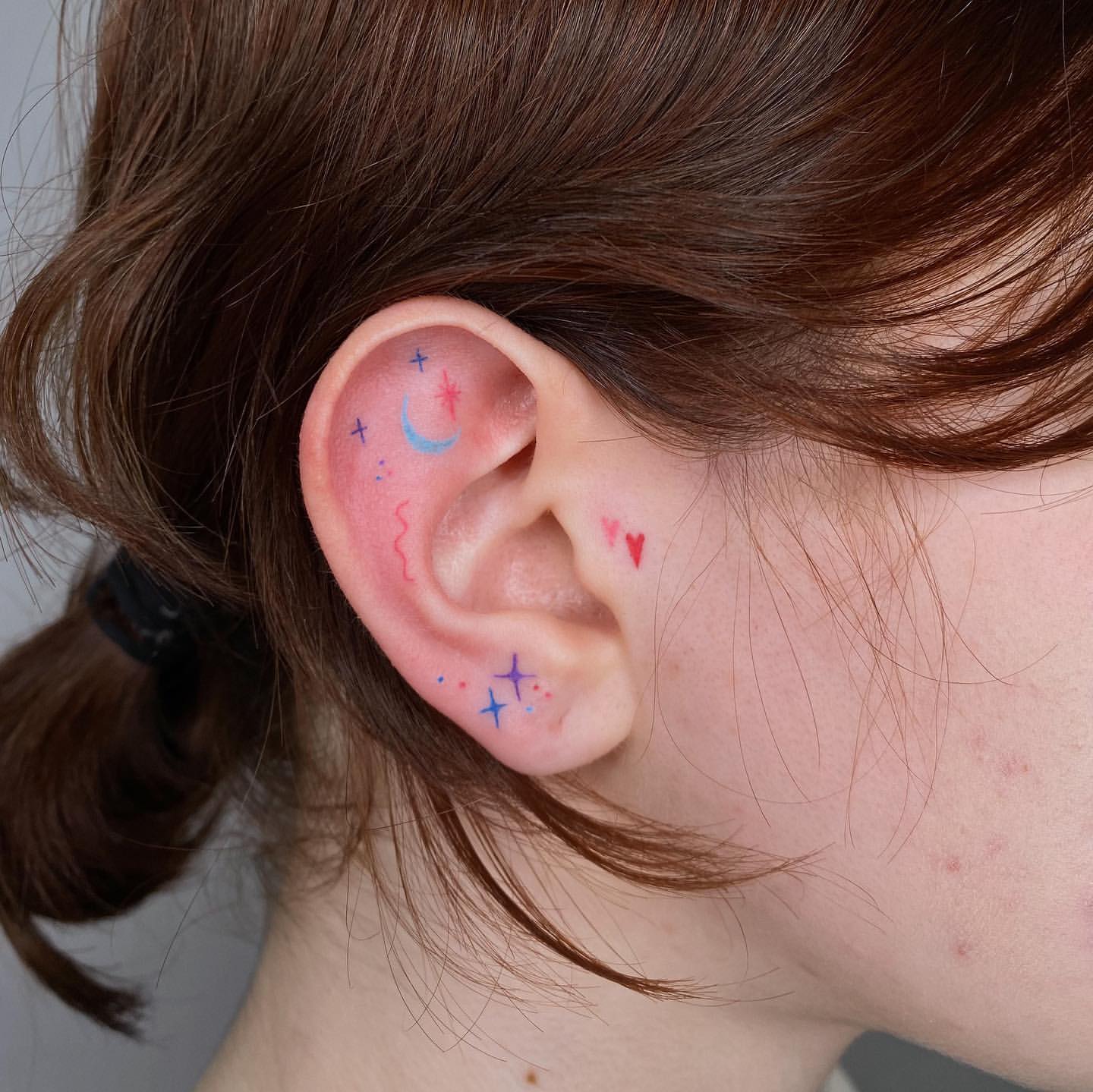 Ear Tattoo Ideas 17
