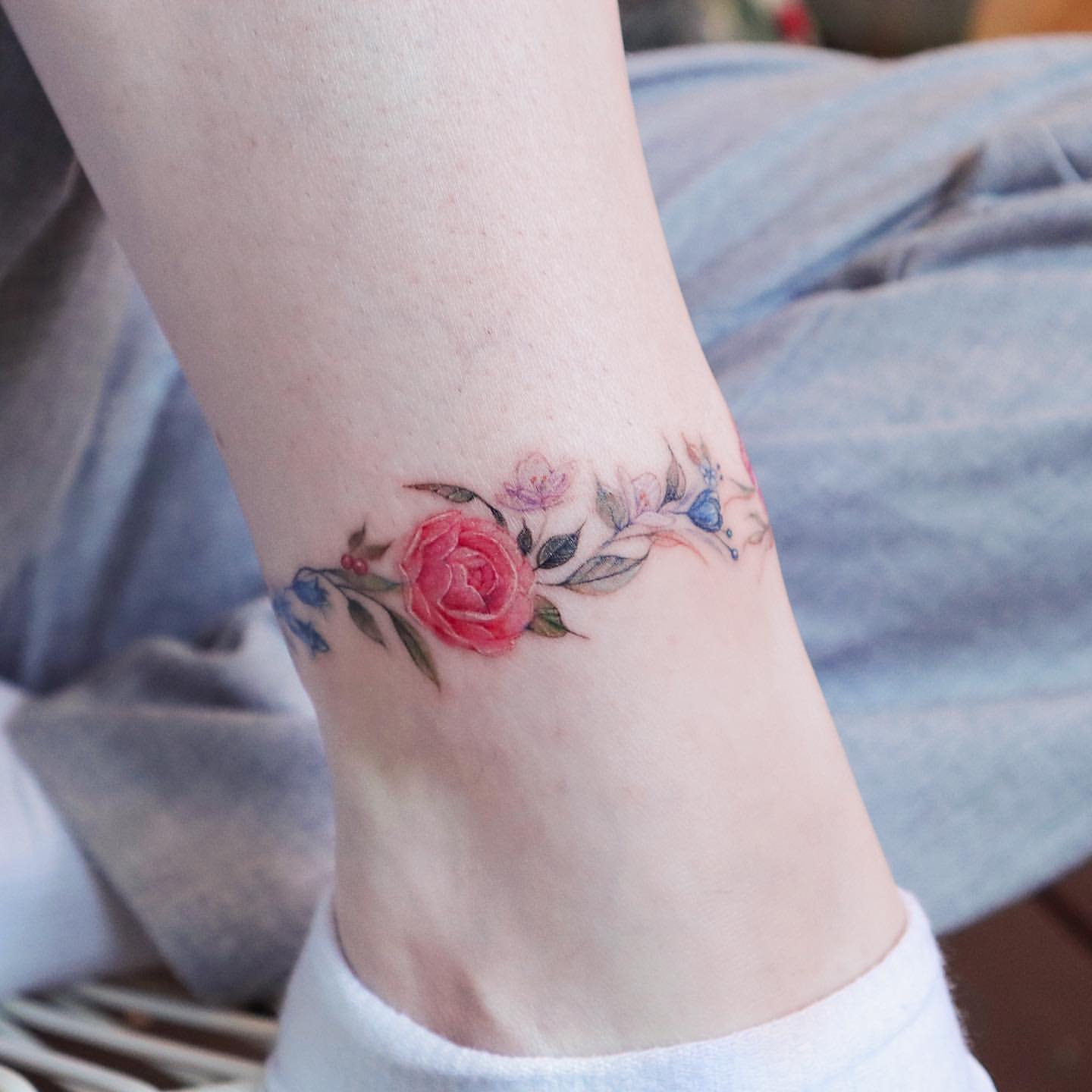 Wrap Around Ankle Tattoos 9