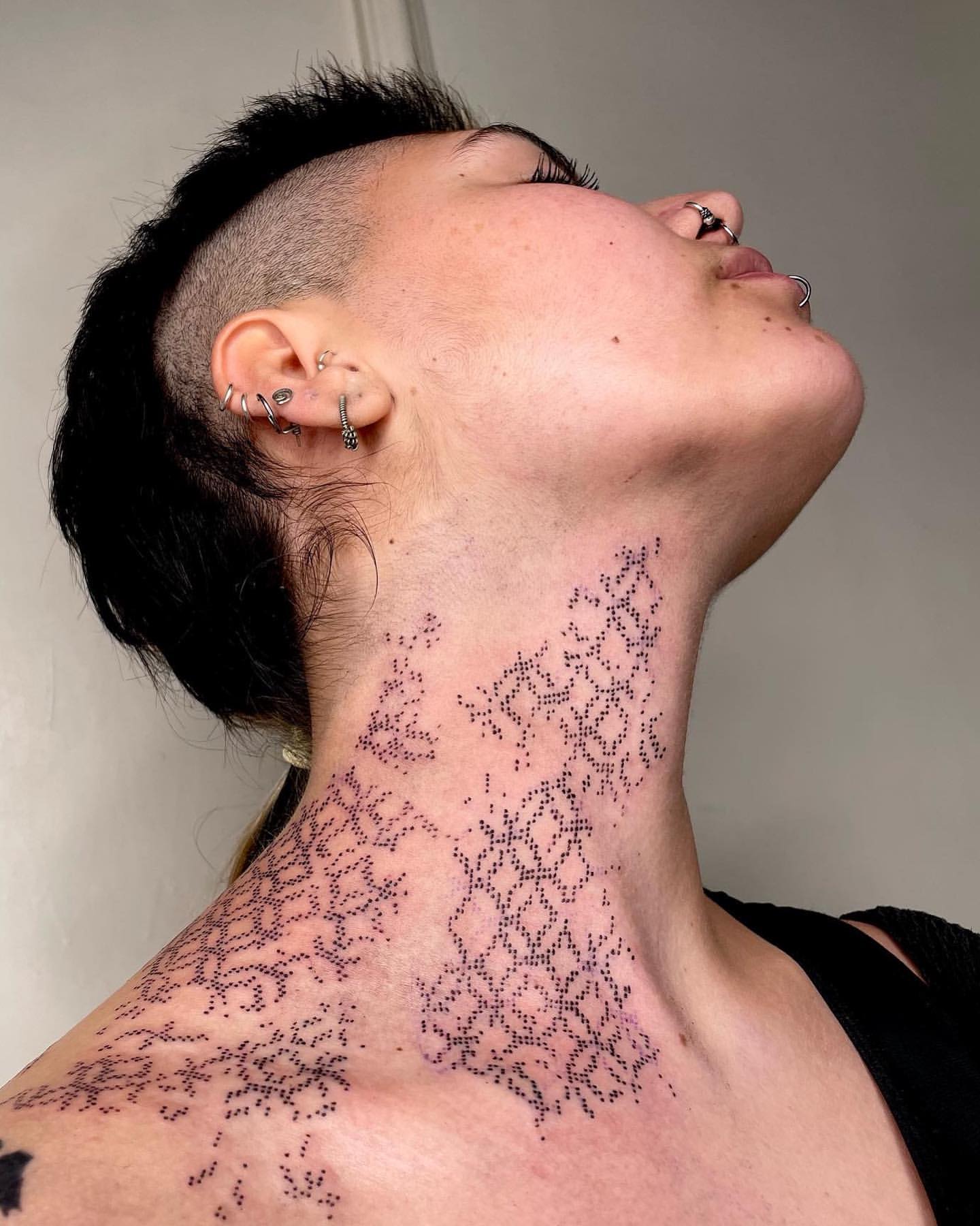 Throat Tattoo Ideas for Women 15