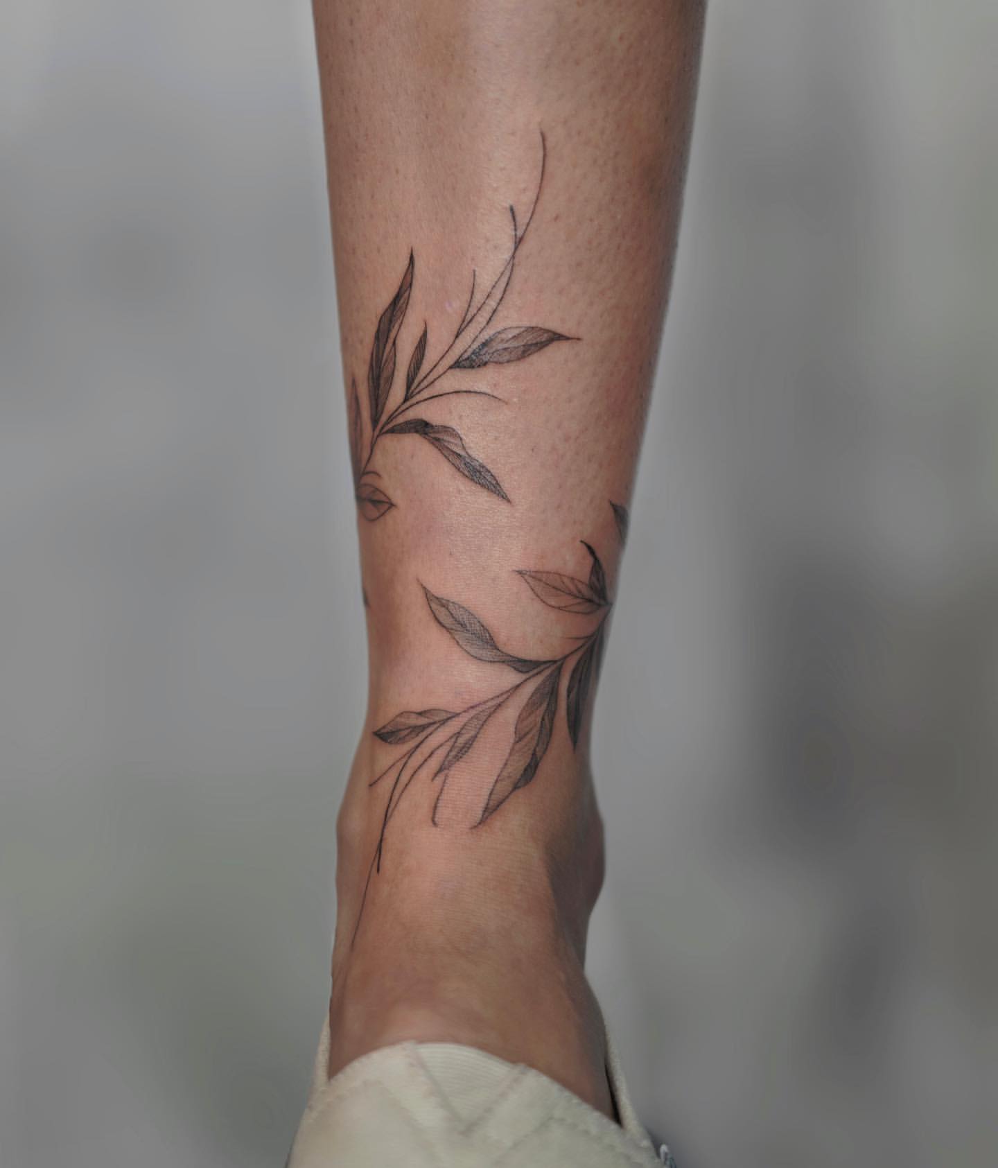 Wrap Around Ankle Tattoos 17