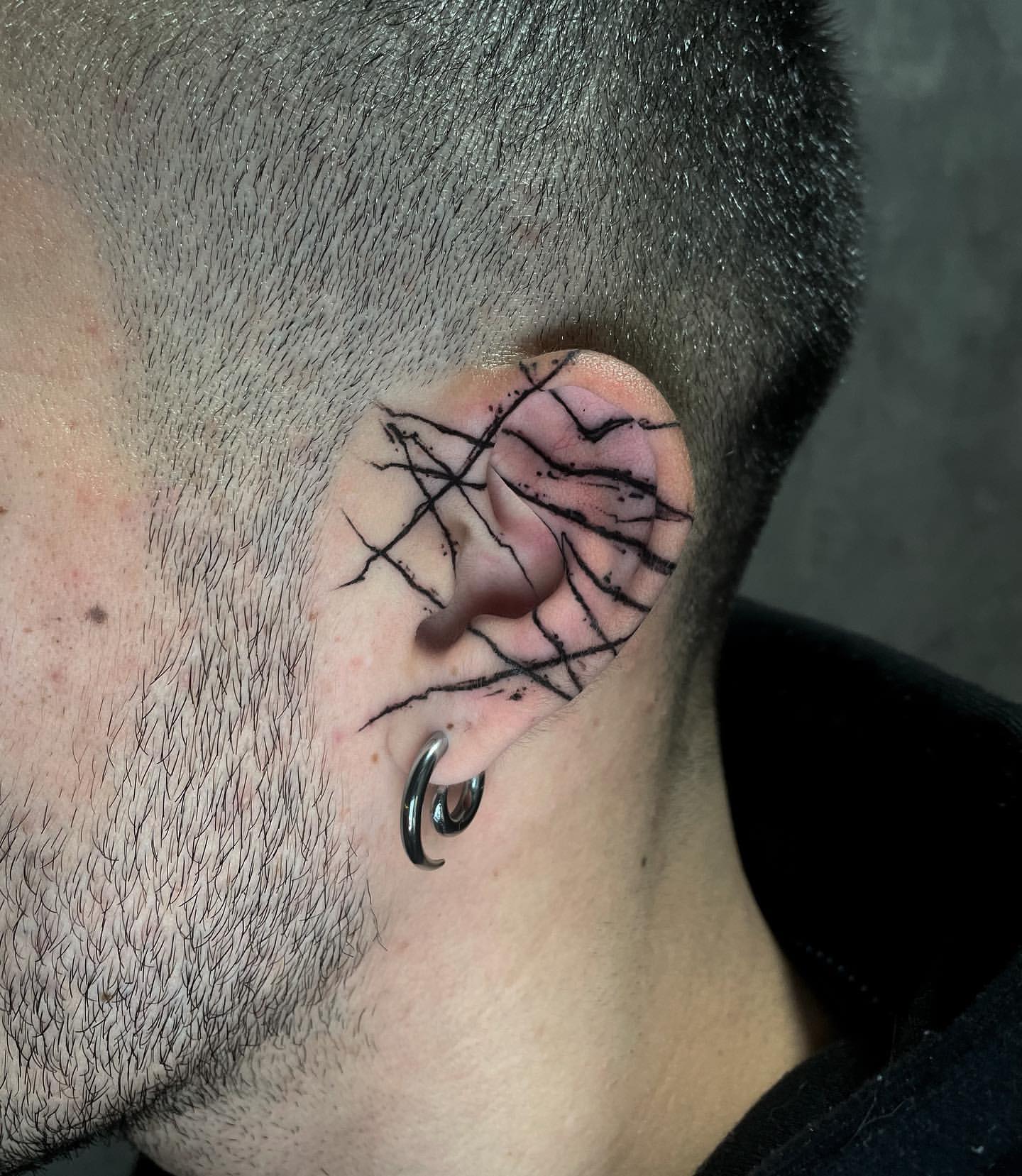 Ear Tattoo Ideas 26