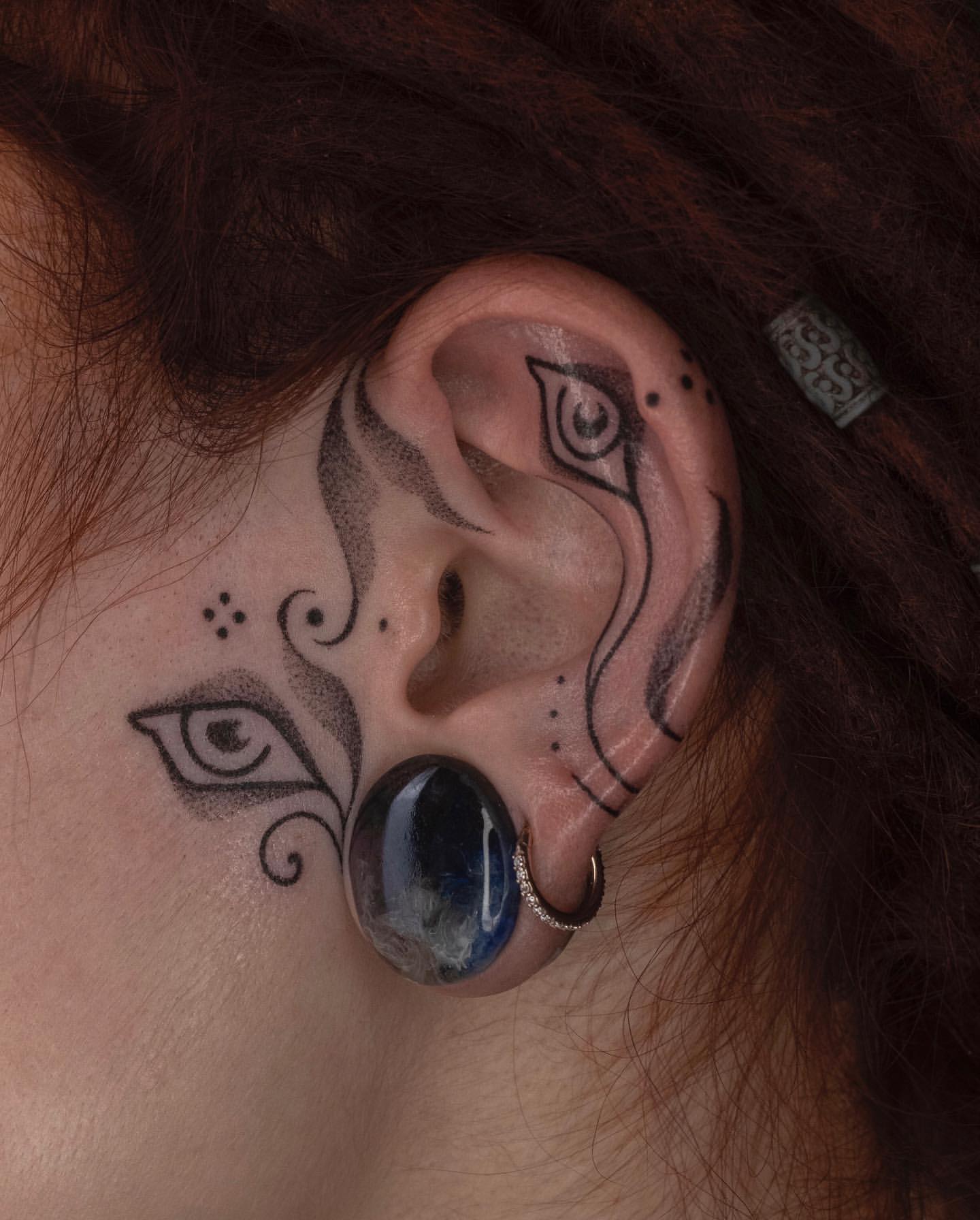 Ear Tattoo Ideas 28