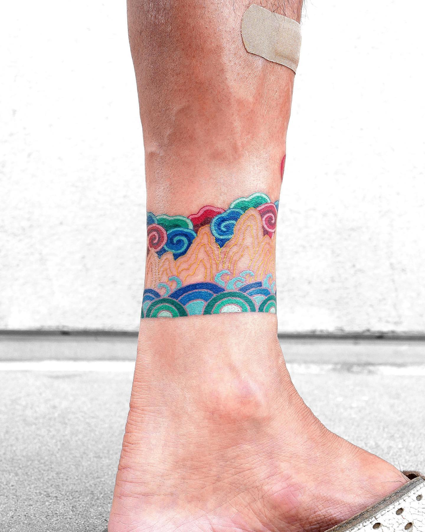 Wrap Around Ankle Tattoos 31