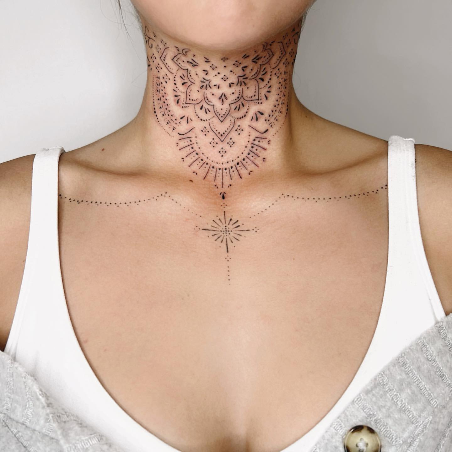 Throat Tattoo Ideas for Women 23
