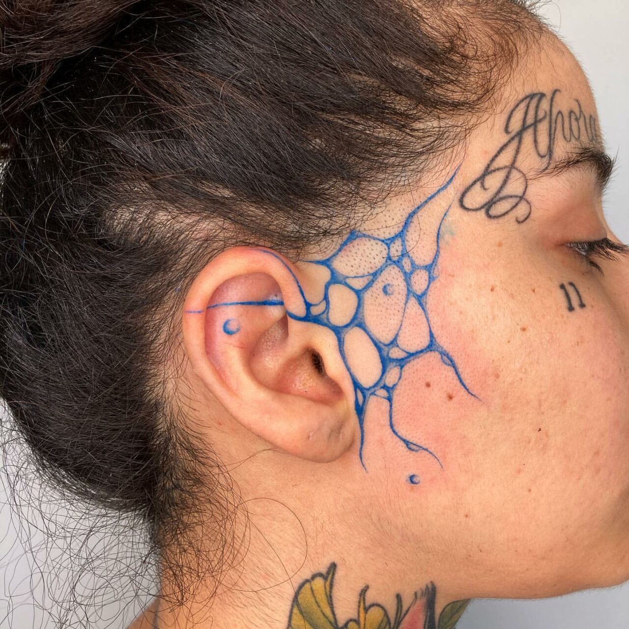 33 Stunning & Creative Face Tattoos for Women in 2024