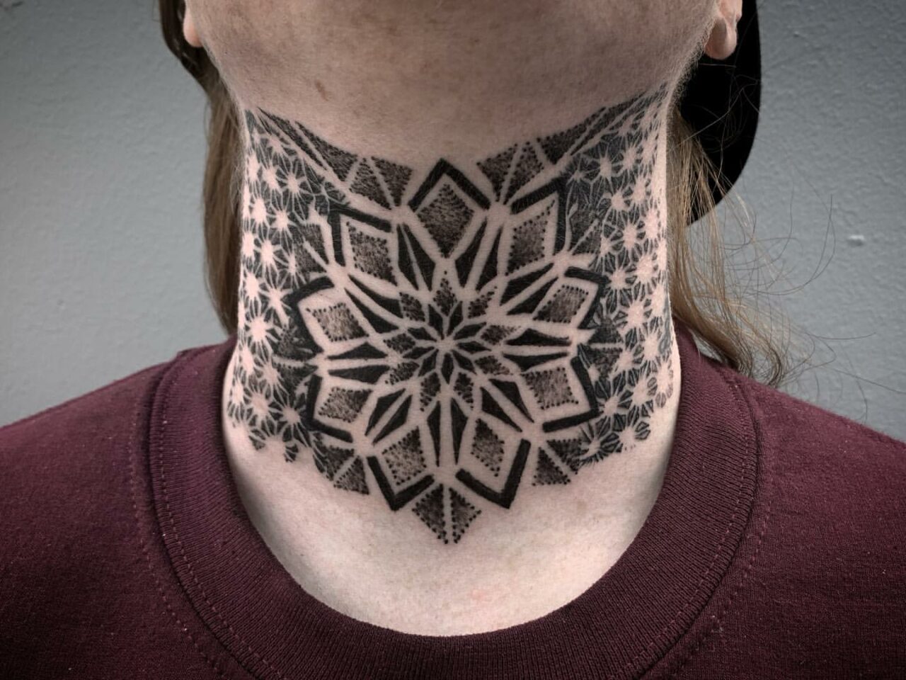 33 Fantastic Throat Tattoo Ideas for Women in 2024
