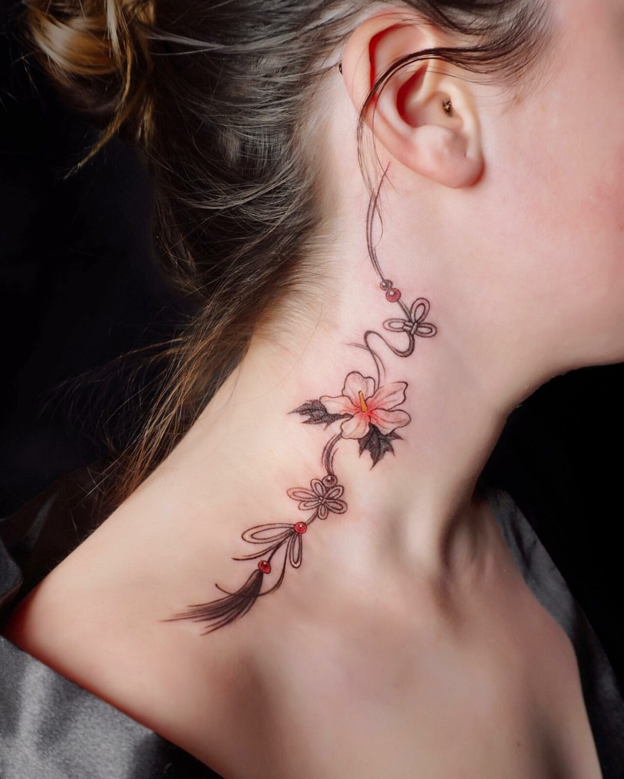 33 Fantastic Throat Tattoo Ideas for Women in 2024