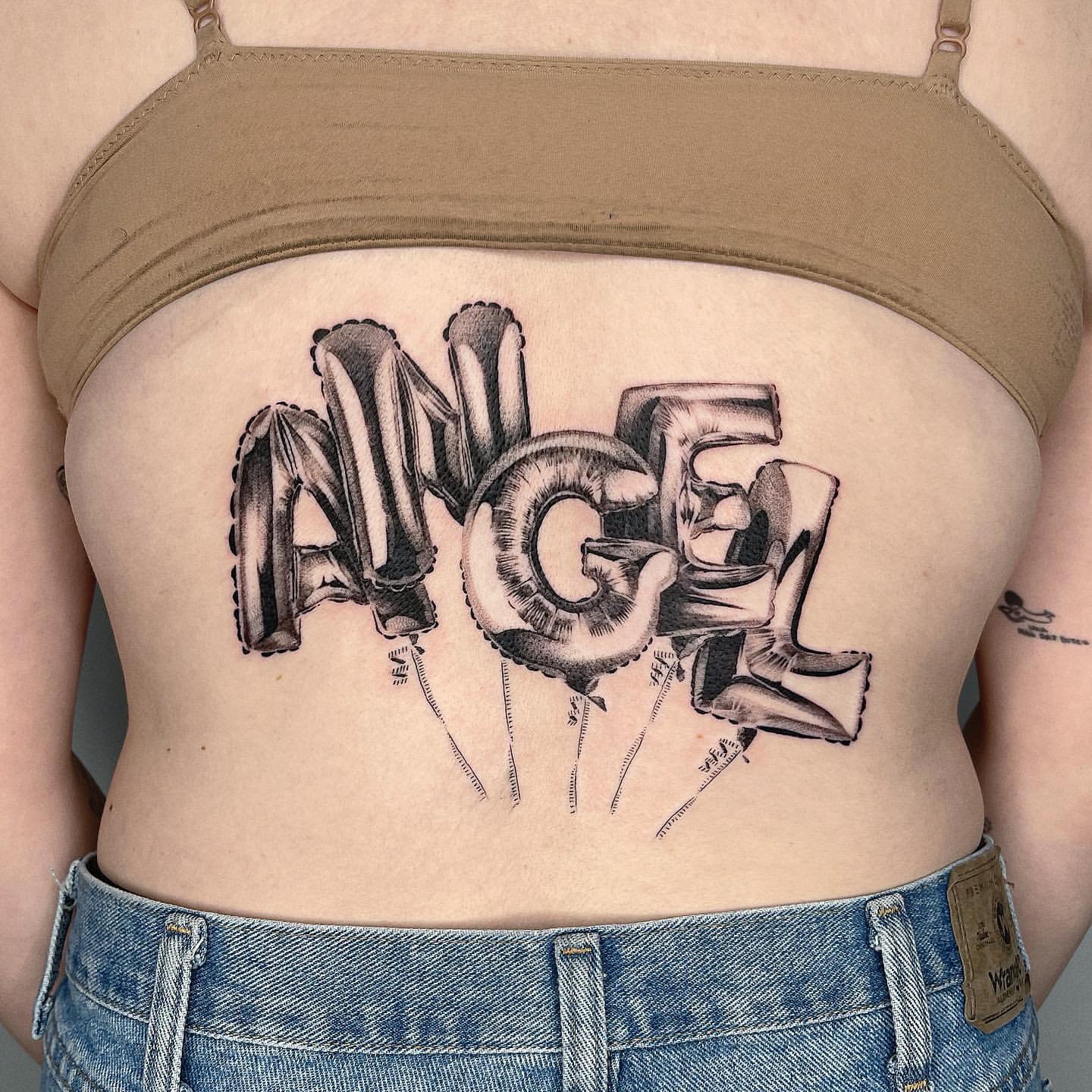 Lower Back Tattoos for Women 27