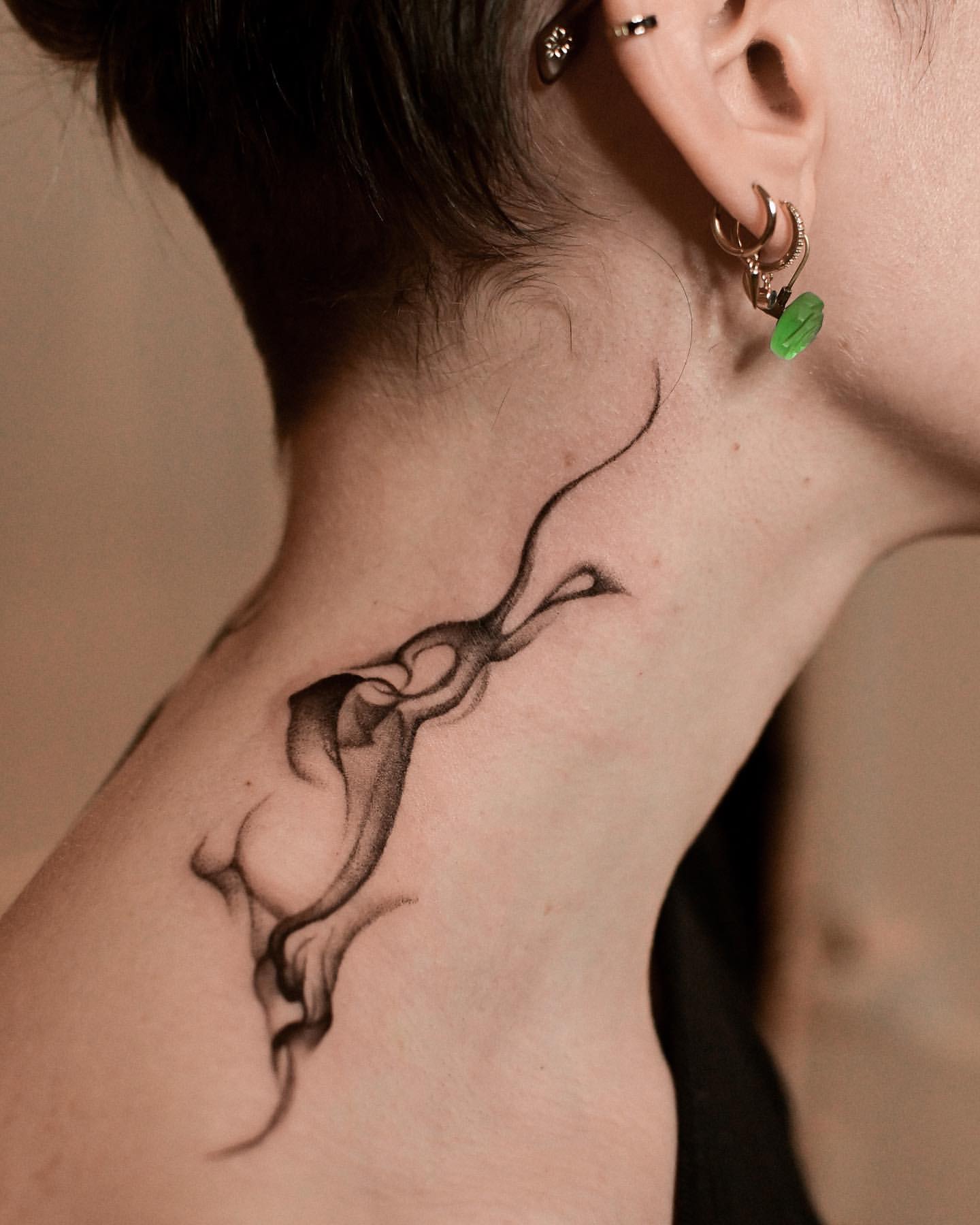 Throat Tattoo Ideas for Women 30