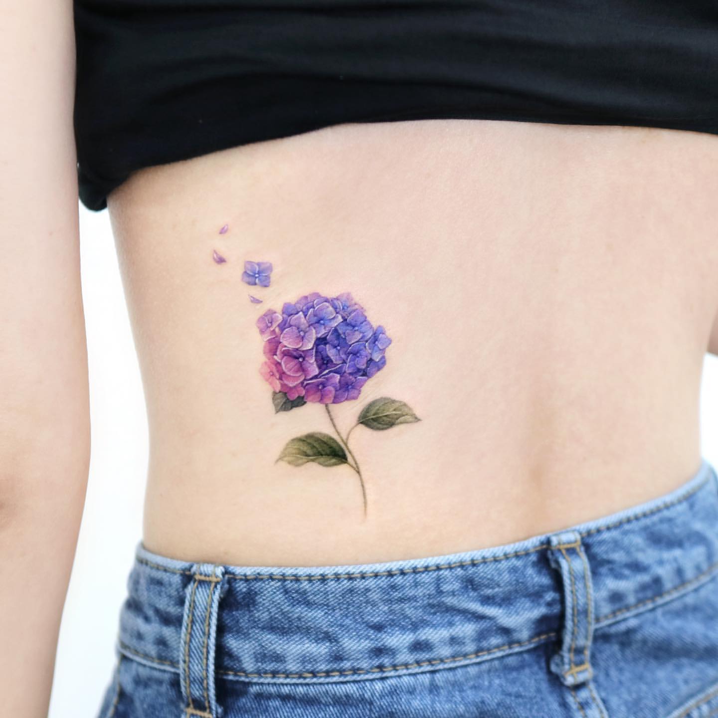 Lower Back Tattoos for Women 33