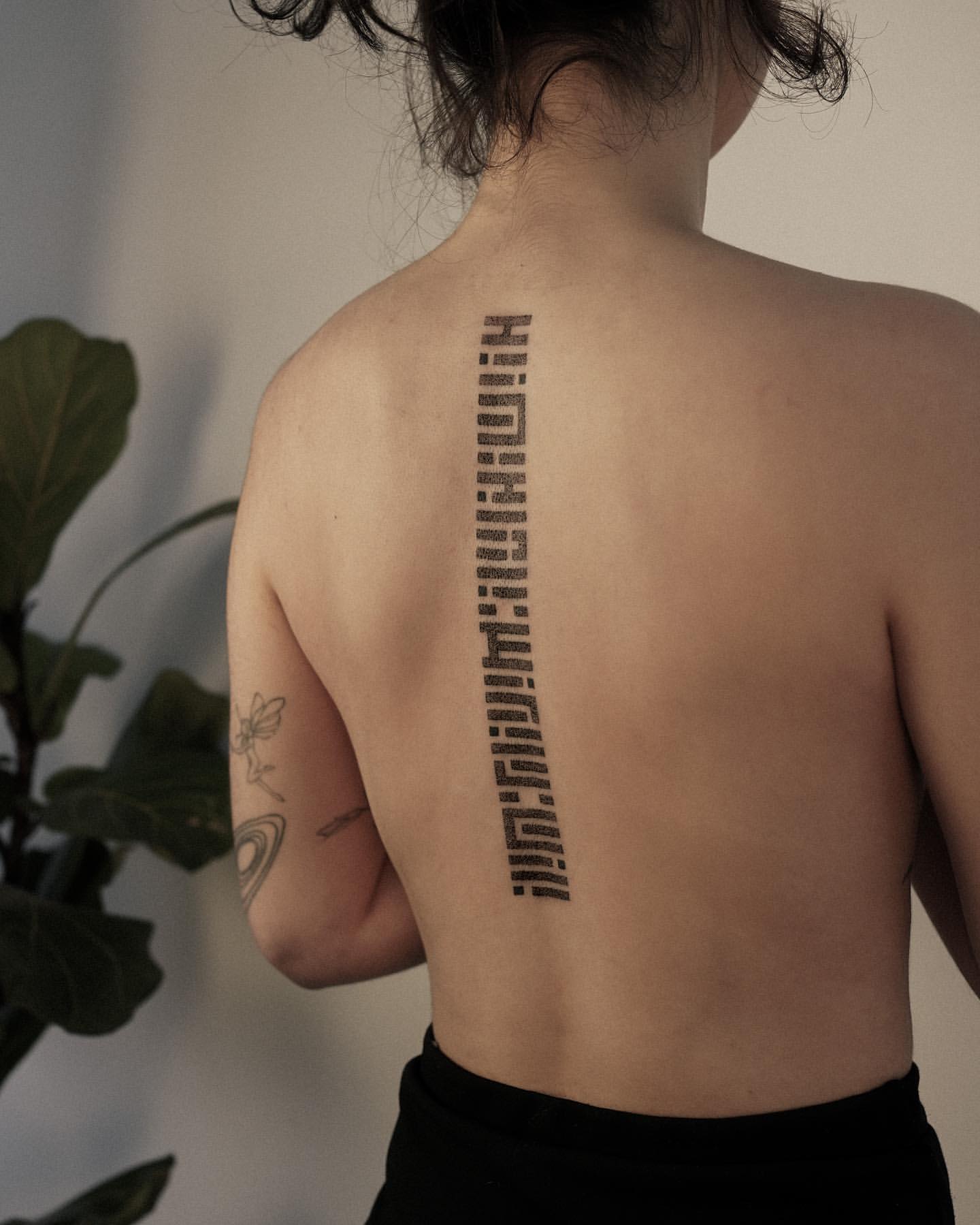 Spine Tattoos for Women 33
