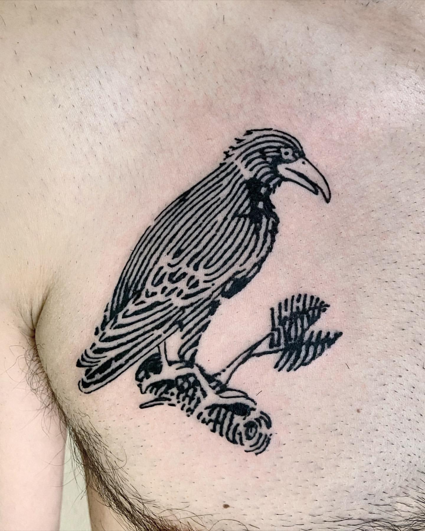 Eagle tattoo located on the head, illustrative style.