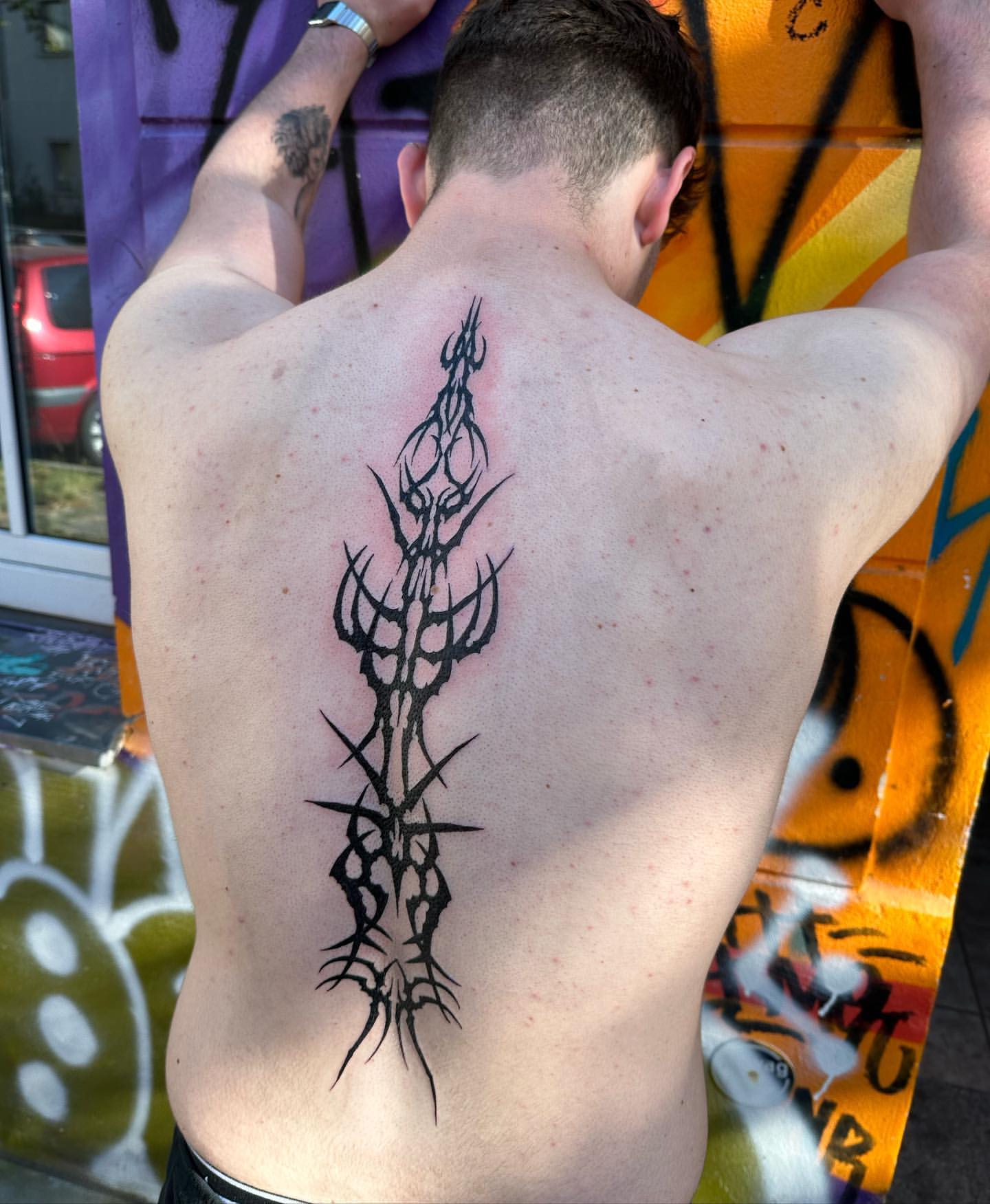 Spine Tattoos for Men 31
