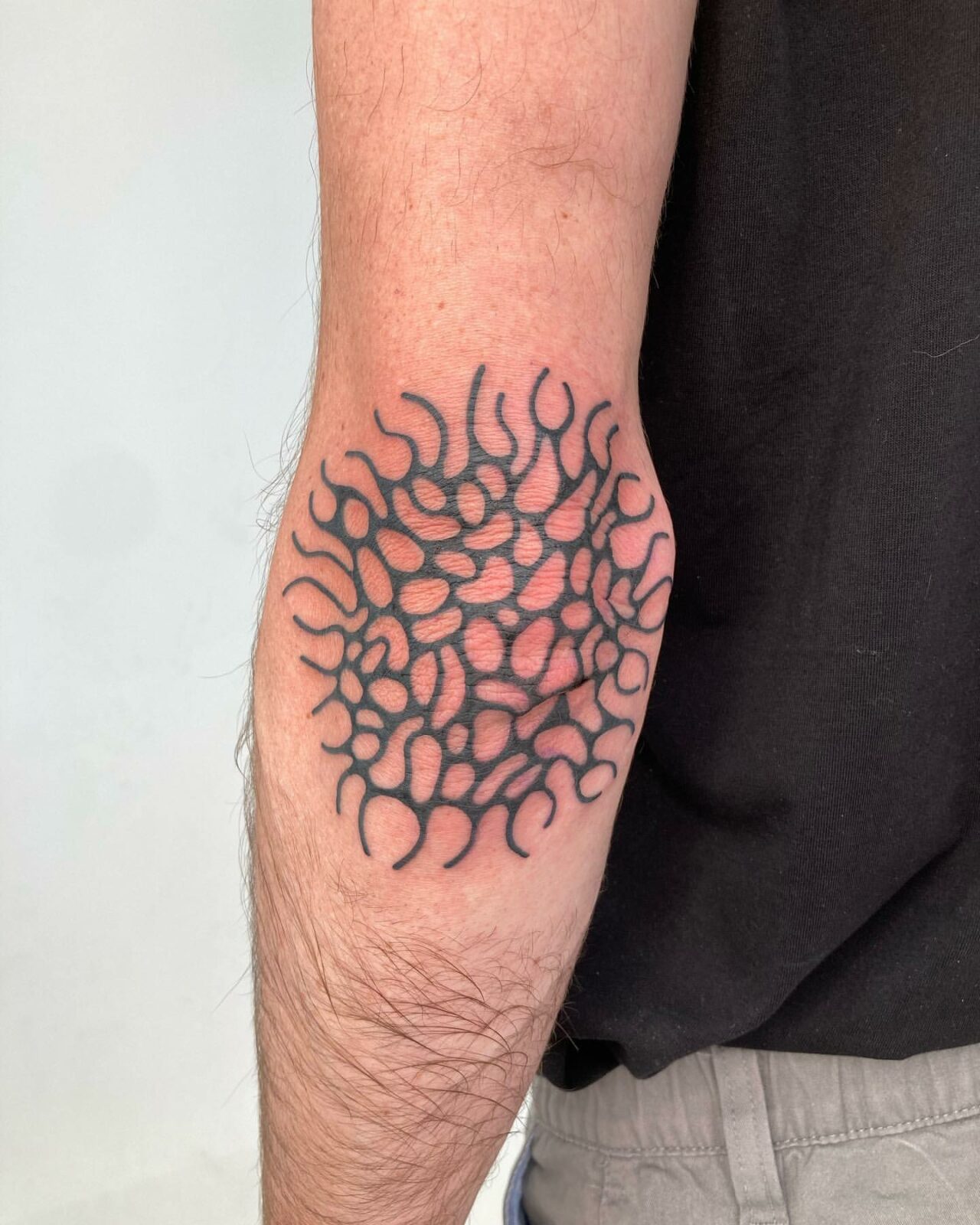 33 Exciting Elbow Tattoos for Men in 2023