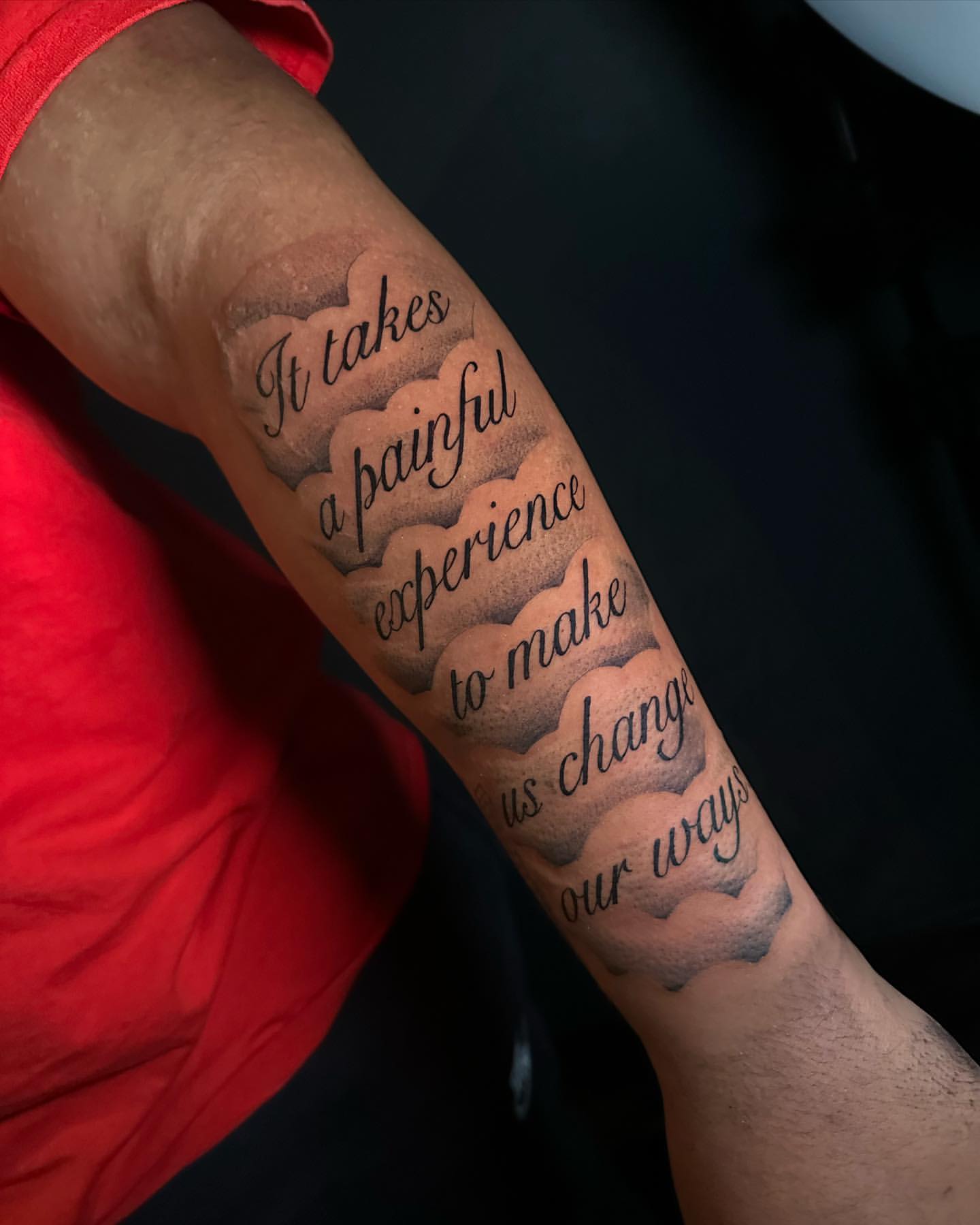 Side tattoo saying 