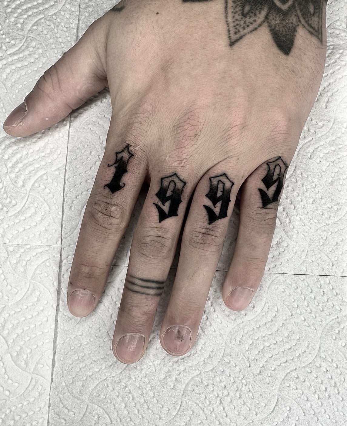 Finger Tattoos for Men 21